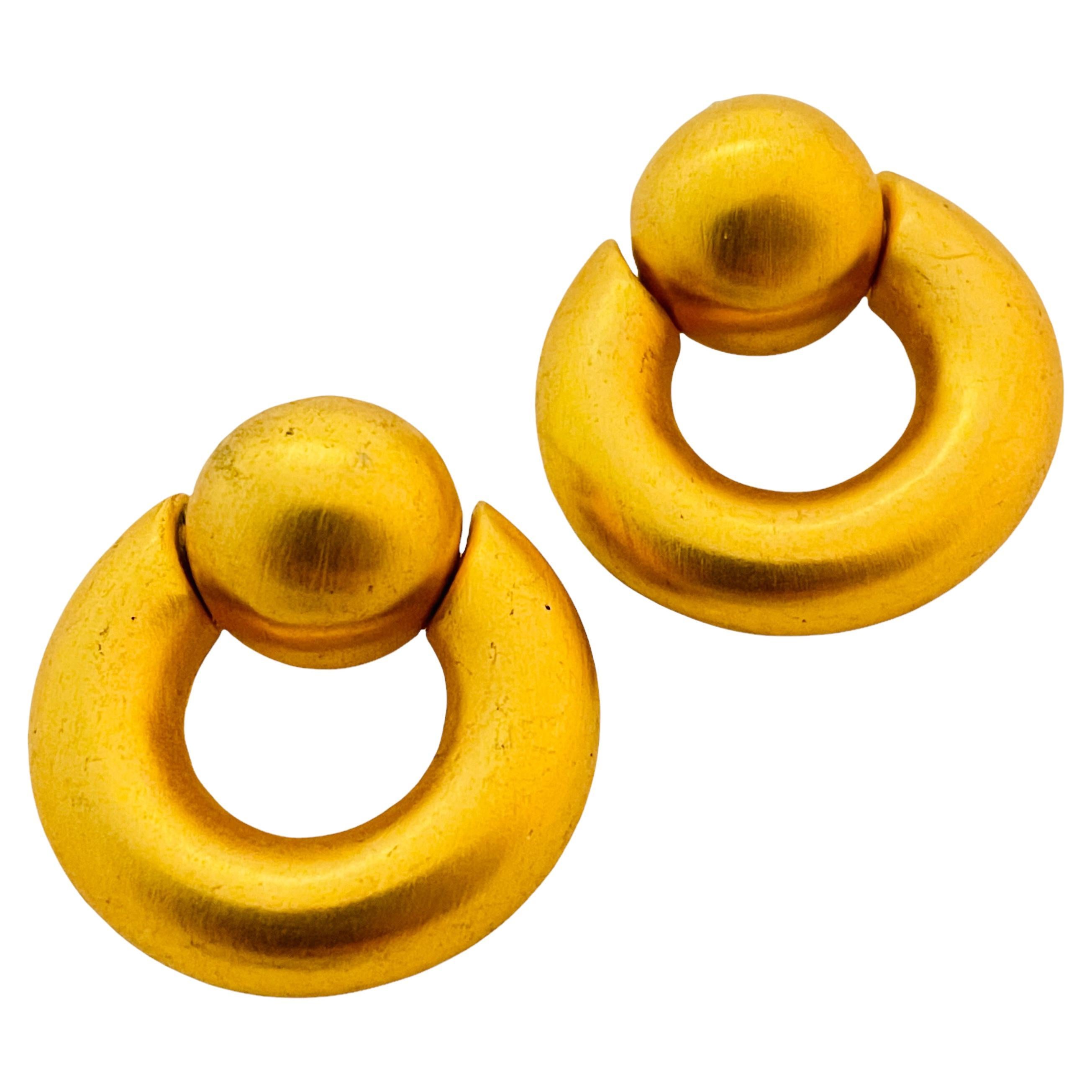 Vintage CLARA matte gold door knocker designer runway earrings For Sale
