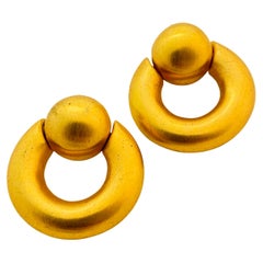 Vintage CLARA matte gold door knocker designer runway earrings