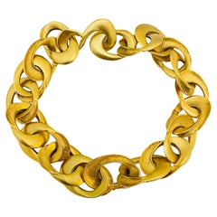 Vintage CLARA STUDIO  matte gold chain logo designer runway necklace