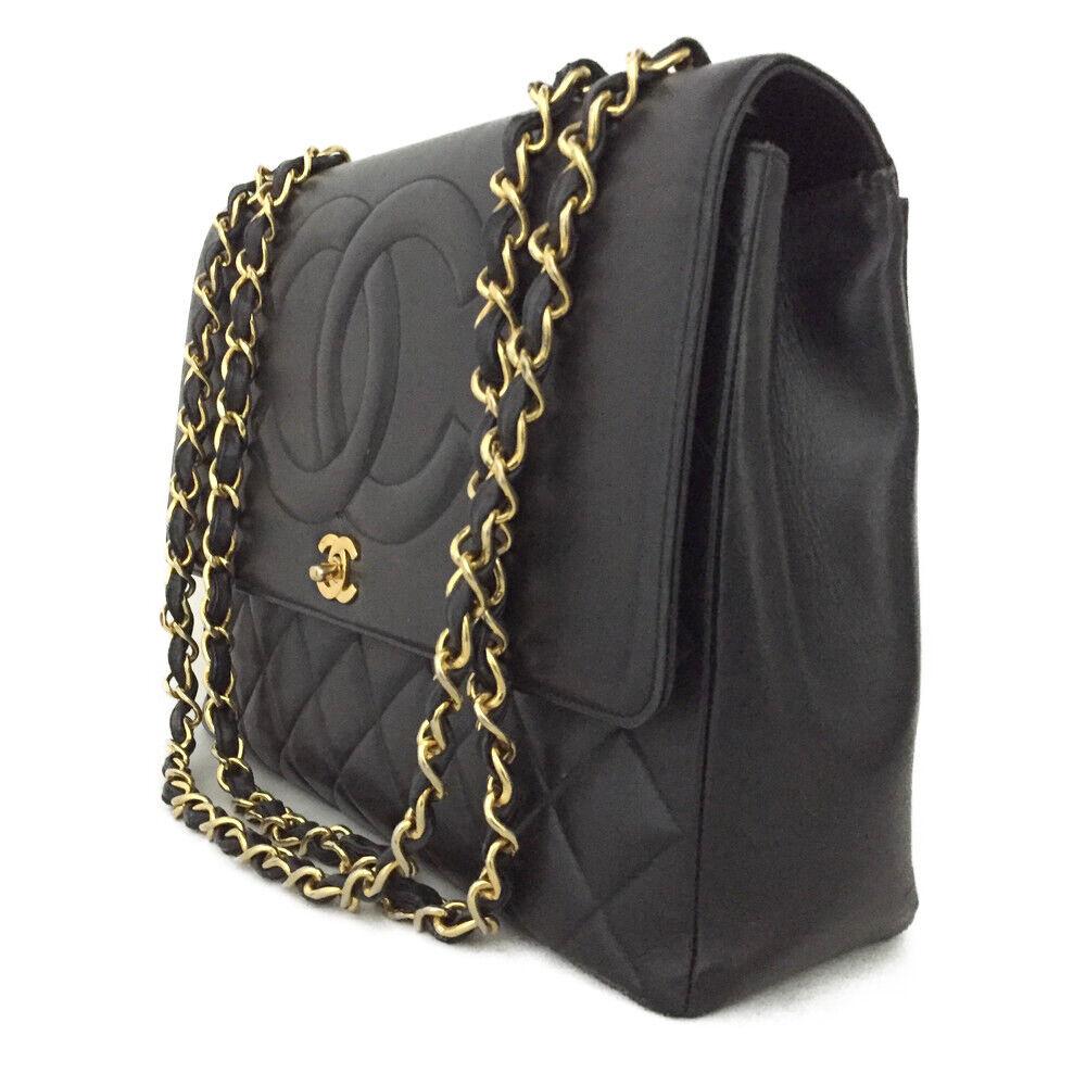Classic Double CC Logo Jumbo Leather
 Shoulder Bag . 

Stunning Vintage Designed leather with Large CC logo in front of the bag with stunning gold hardware. The buckle is a small gold CC. The strap is a leather and gold accent. The back of the bag