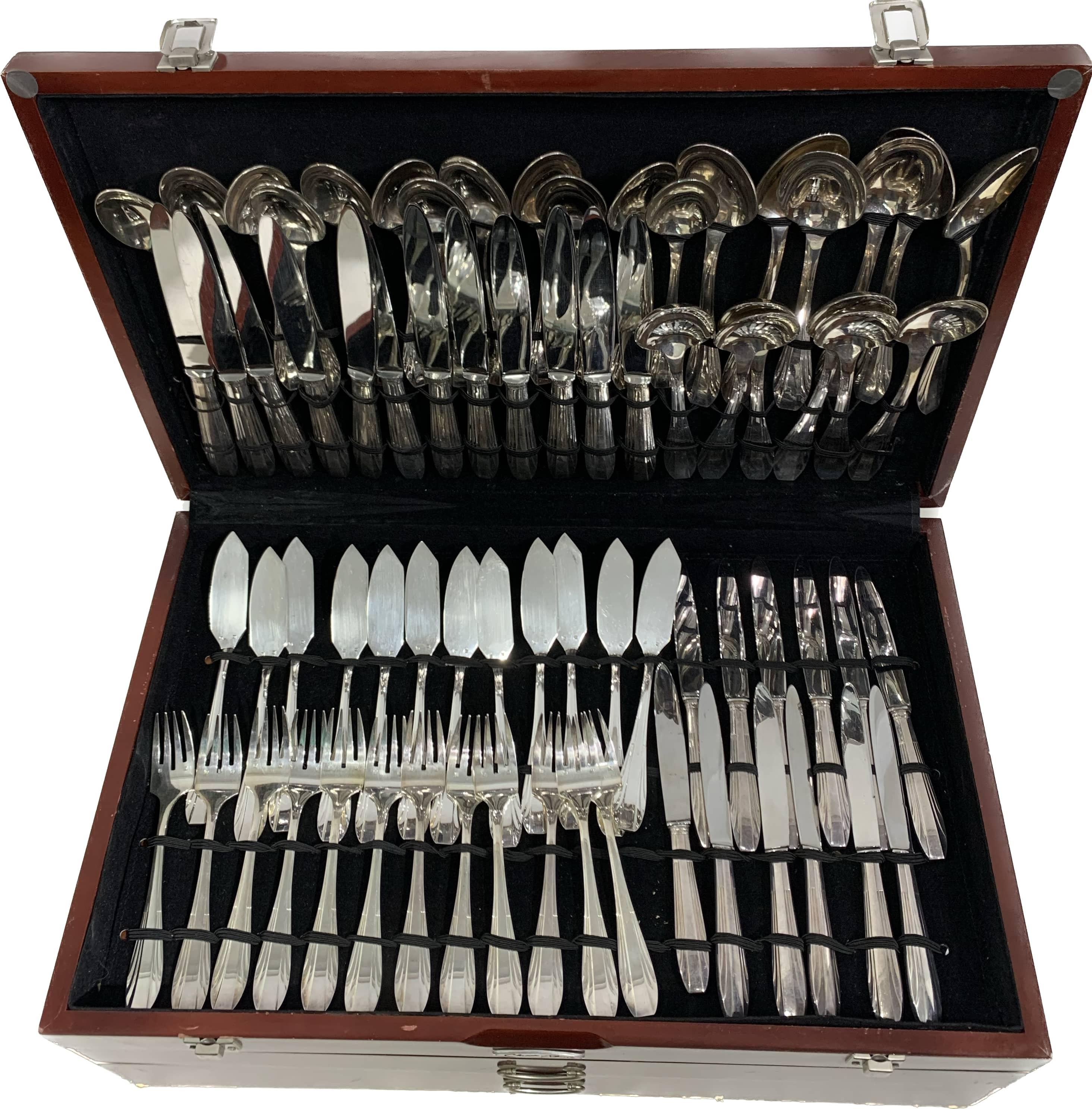 Vintage cutlery box in mahogany wood from Classic Home. It holds sets of 12 for a total of 158 silver plated pieces. The items are silver plated , some handles are engraved and some handles have parts cut and carved from animal bone. They are