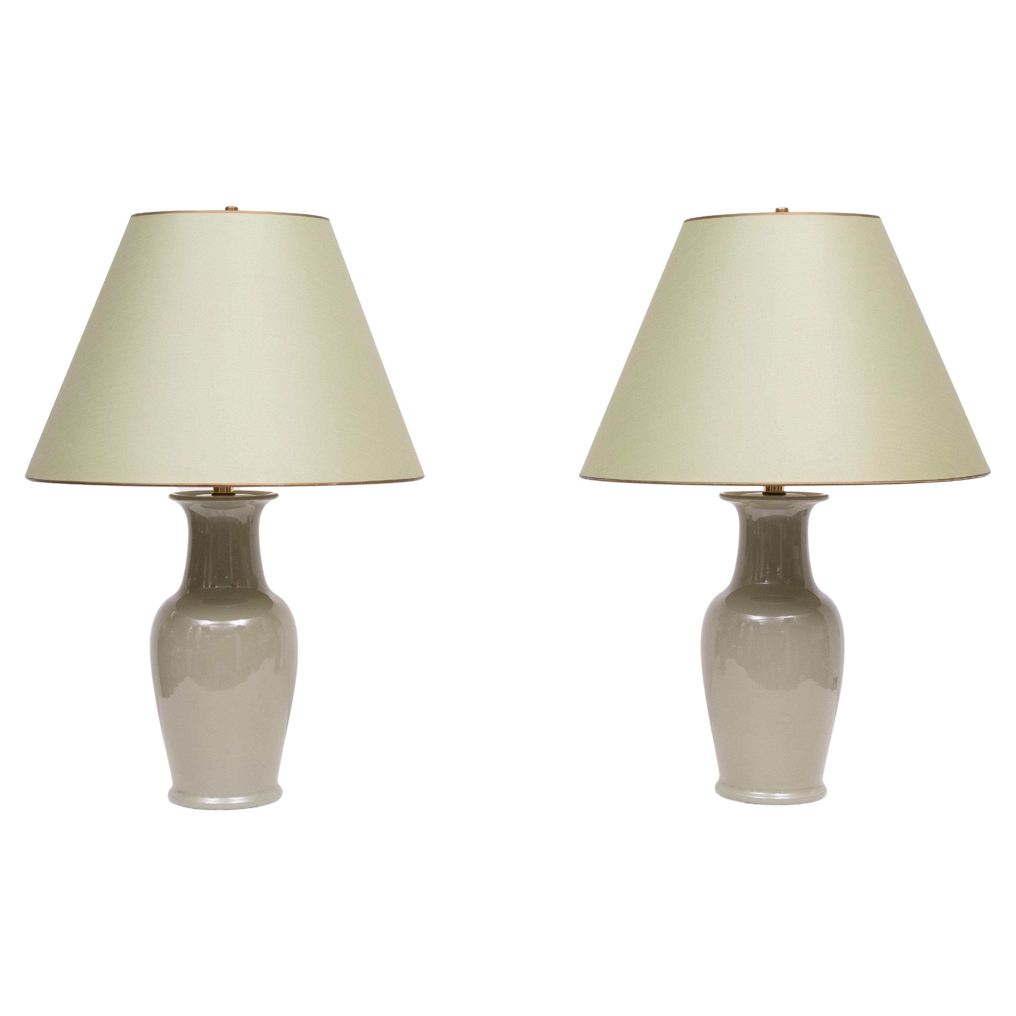 Very nice set of 2 Green Ceramic Table lamps ,comes with 
its original Green shades . Timeless design . 1970s 
good condition . 1 large E27 bulb needed .  each 