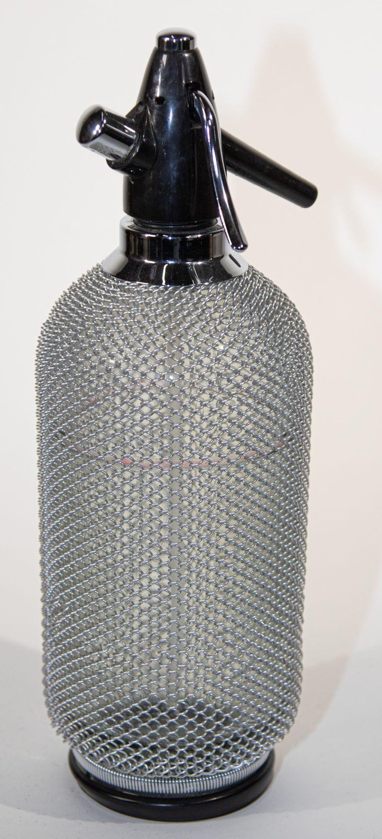 Vintage Classic Soda Siphon Seltzer Glass Bottle with Wire Mesh For Sale at  1stDibs | glass seltzer bottle, vintage soda siphon, soda siphon vintage