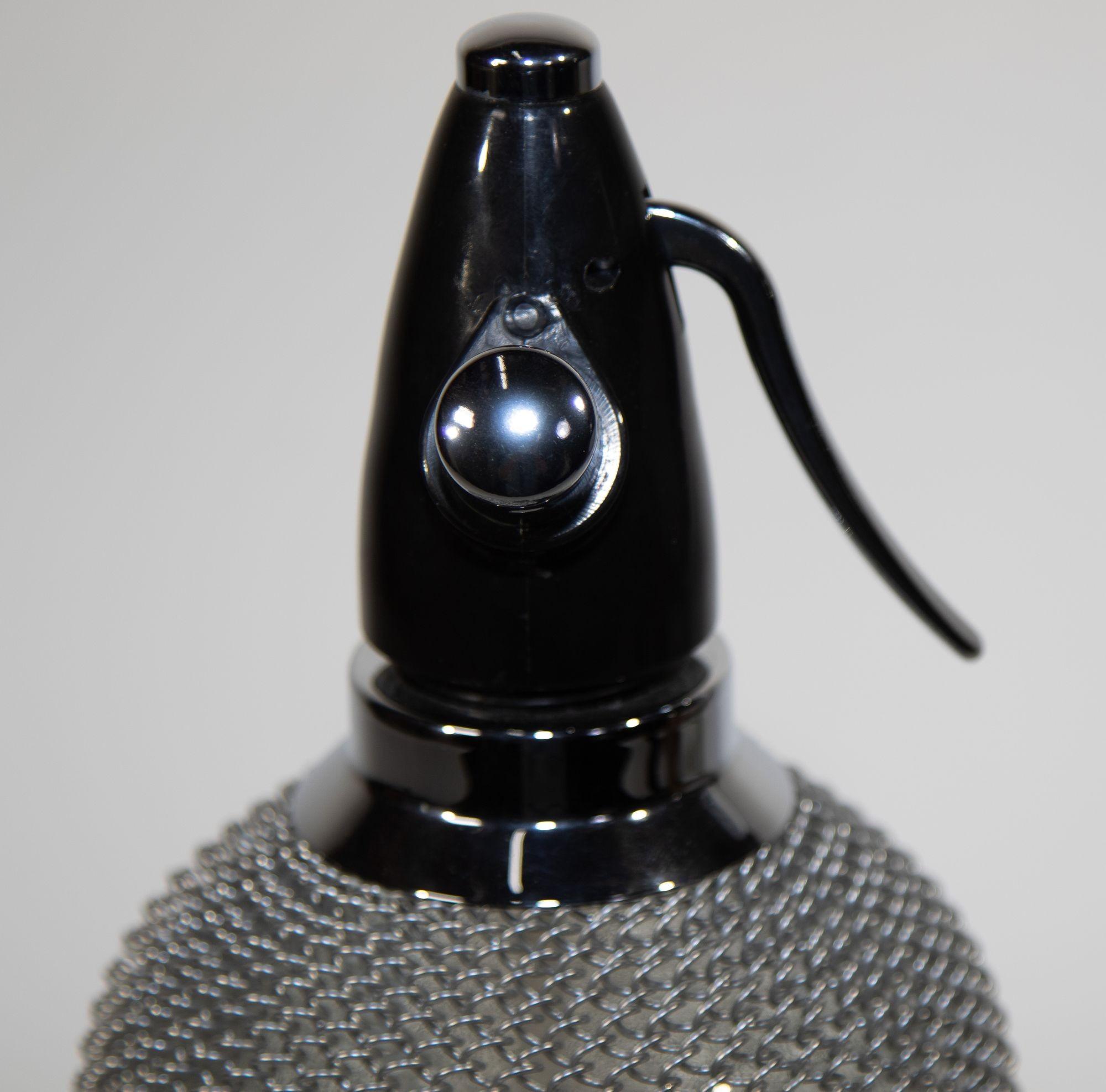 European Vintage Classic Soda Siphon Seltzer Glass Bottle with Wire Mesh For Sale