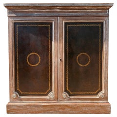 Vintage classical style two door leather and walnut cabinet