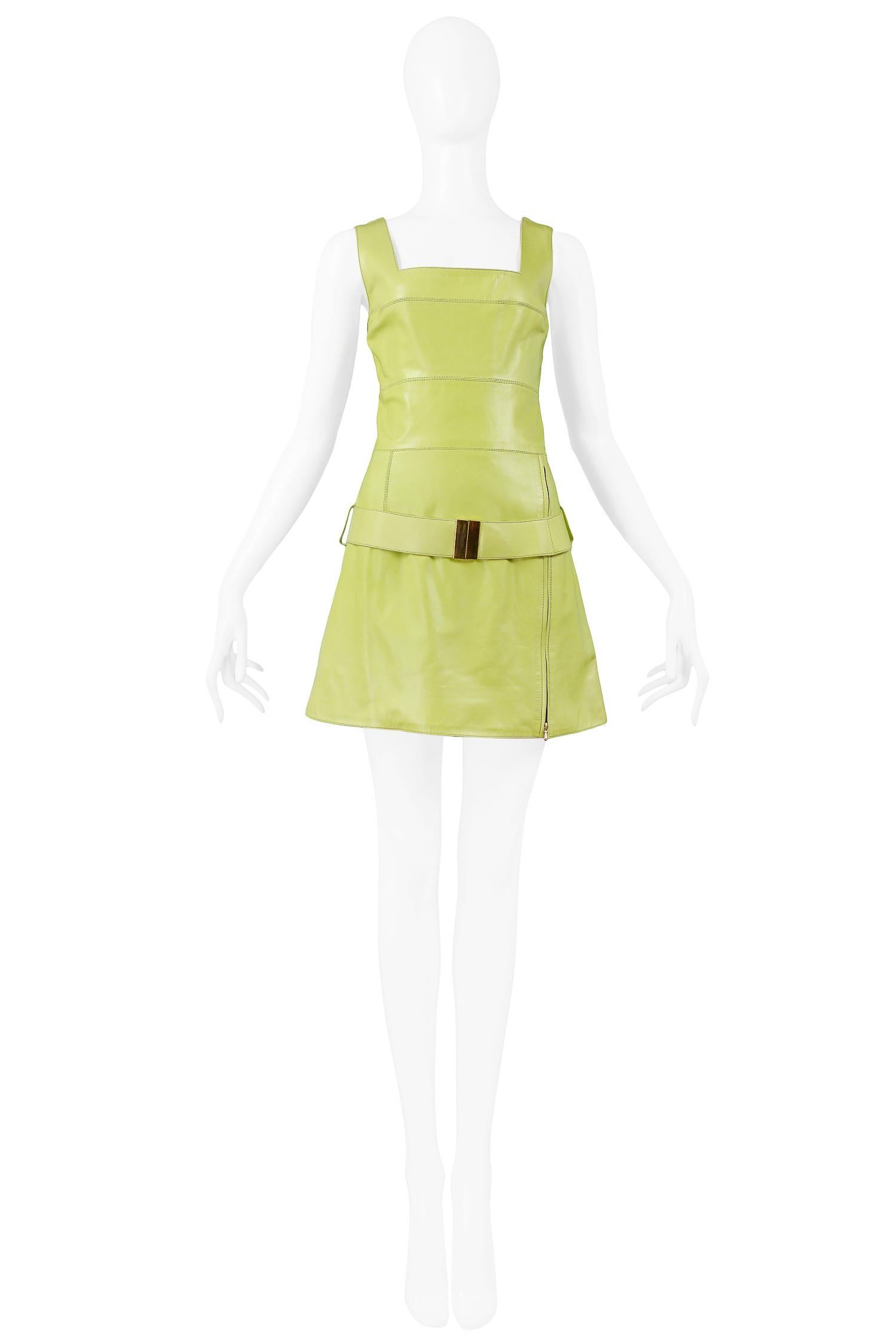 Vintage Claude Montana chartreuse green lamb leather mini dress with matching belt with gold clasp at hip, zipper slit at front, and zipper closure at center back.

Excellent Vintage Condition.

Size 40
