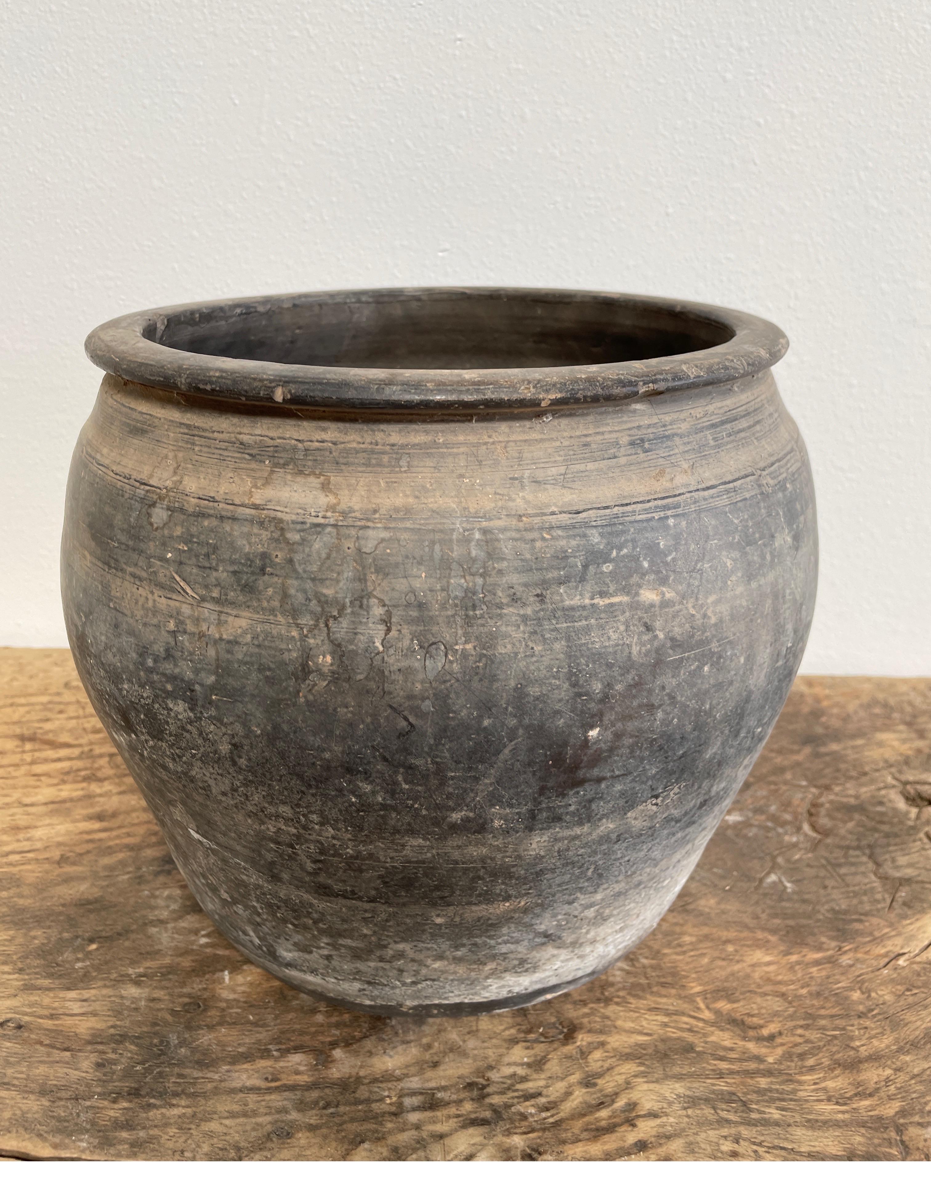 Vintage Pottery
Beautiful and rich in character, this vintage glazed oil pot adds just the right amount of texture + warmth where you need it. Stunning faded black/ brown unglazed finish with warm terra-cotta accents.
Some have a more faded