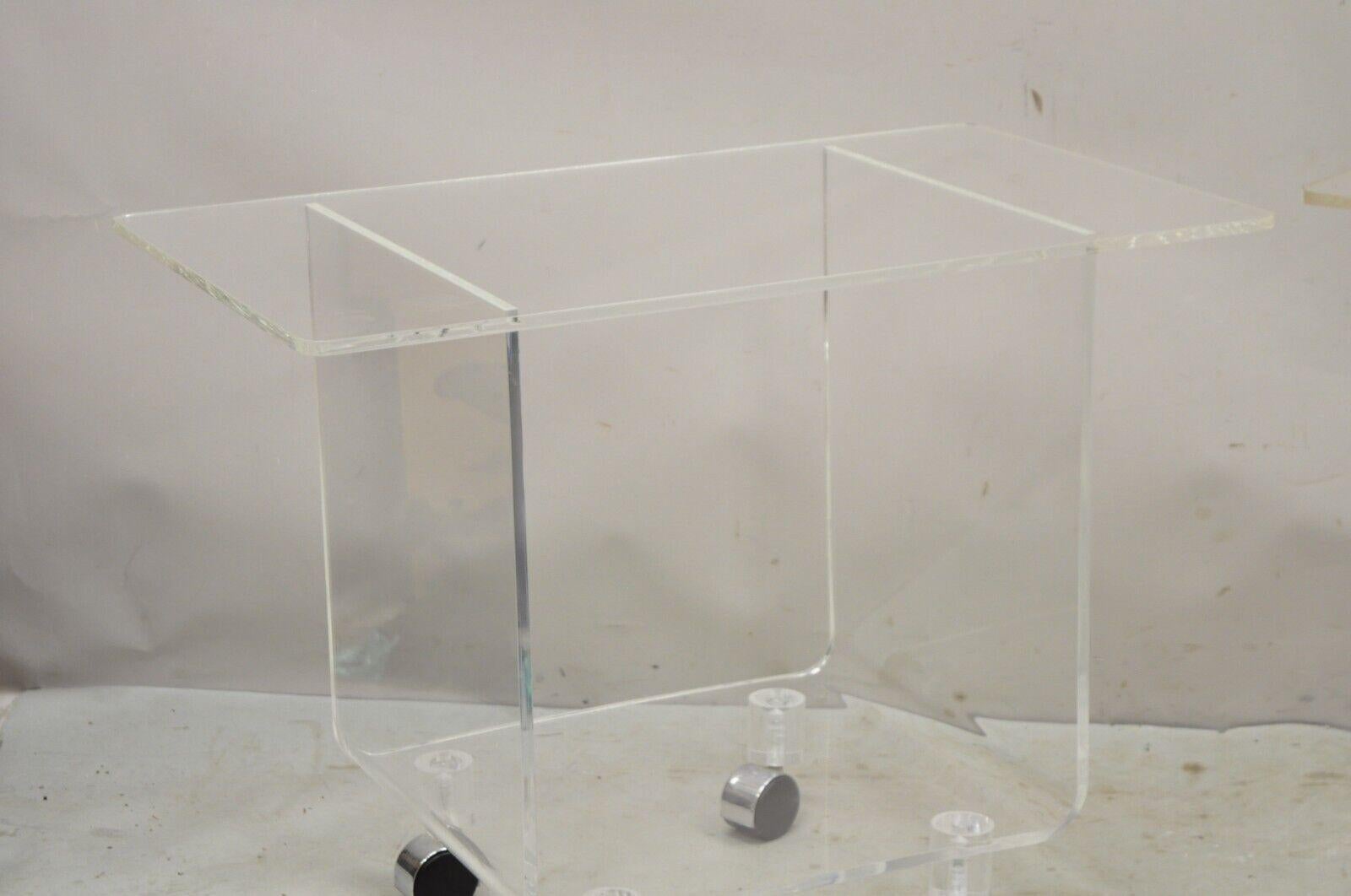 Vintage Clear Lucite Acrylic Mid Century Modern Rolling Side Tables - a Pair In Good Condition For Sale In Philadelphia, PA
