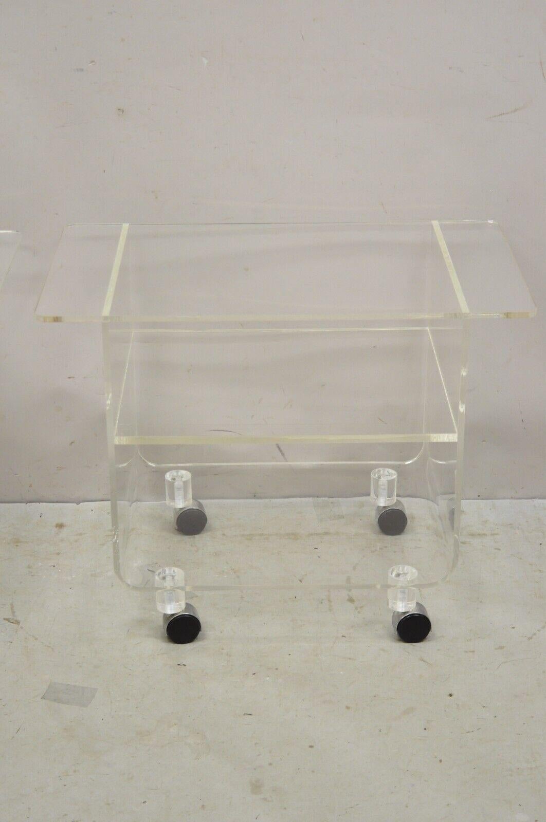 20th Century Vintage Clear Lucite Acrylic Mid Century Modern Rolling Side Tables - a Pair For Sale