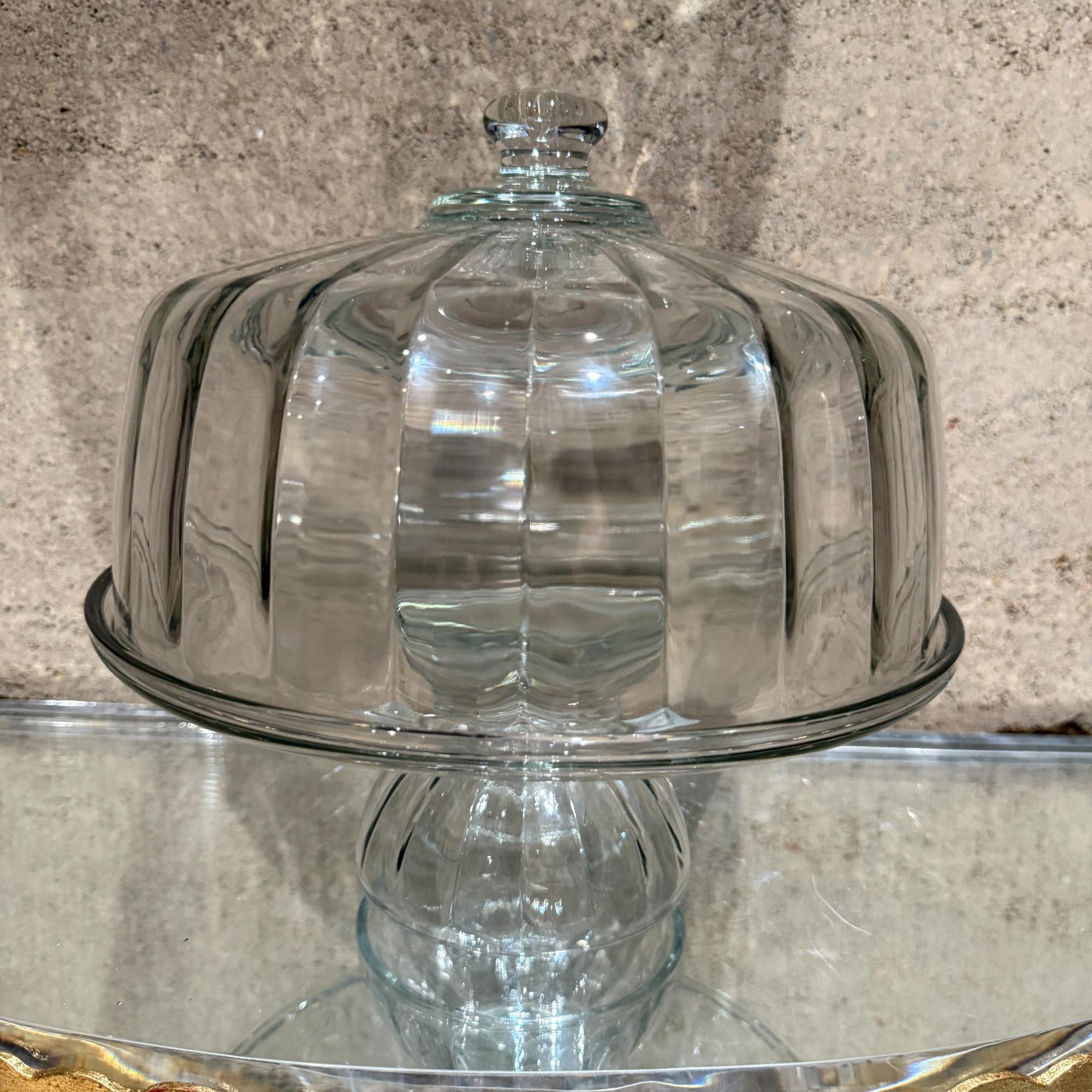For your consideration, a vintage clear ribbed glass pedestal footed cake plate stand & dome lid cover. Unmarked.

Dimensions: 10.25