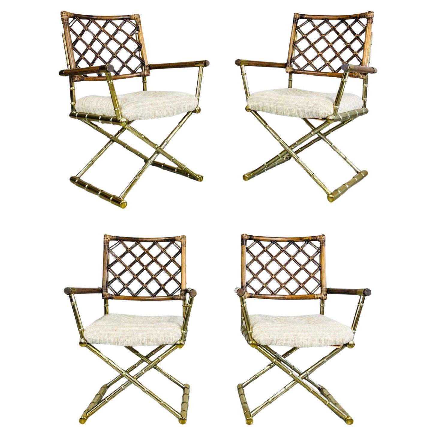 Vintage 5-piece dining set having 4 Hollywood Regency armchairs having faux bamboo brass X-form bases with cane wrapped bamboo lattice backrests and neutral tweed soft cushion seats with matching glass top table by Daystrom circa 1985. Very