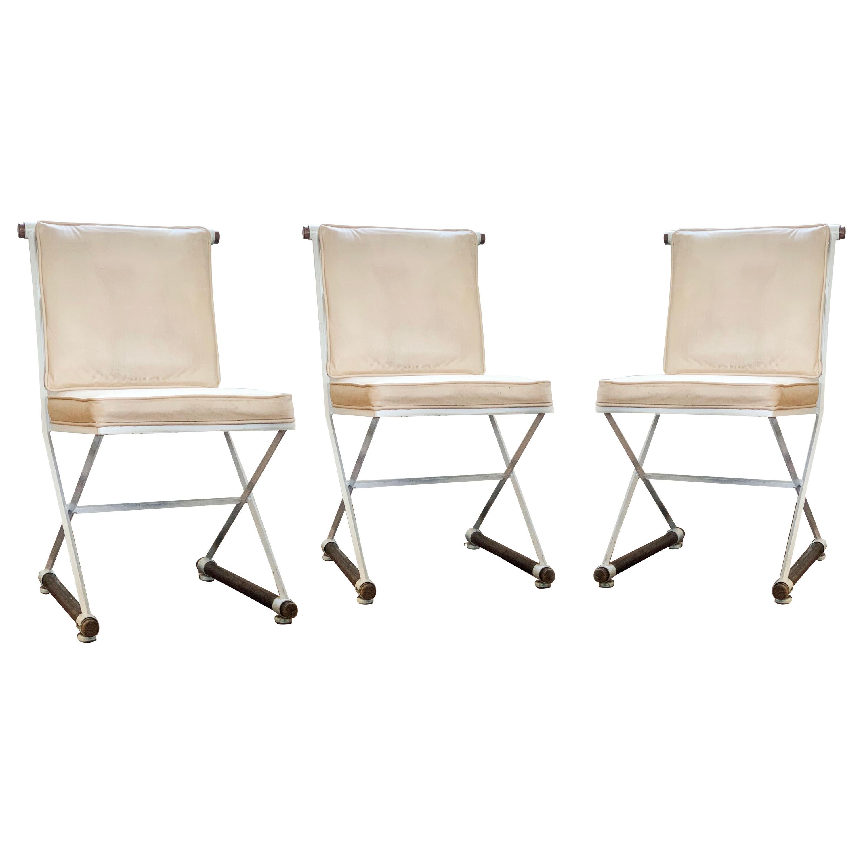 Wrought iron and oak Cleo Baldon white terra dining chair, midcentury, California, 1960s. Original leather (or leather-like) peachy cushions. White finish appears to be original and remains in good condition considering age. Priced per chair, 3