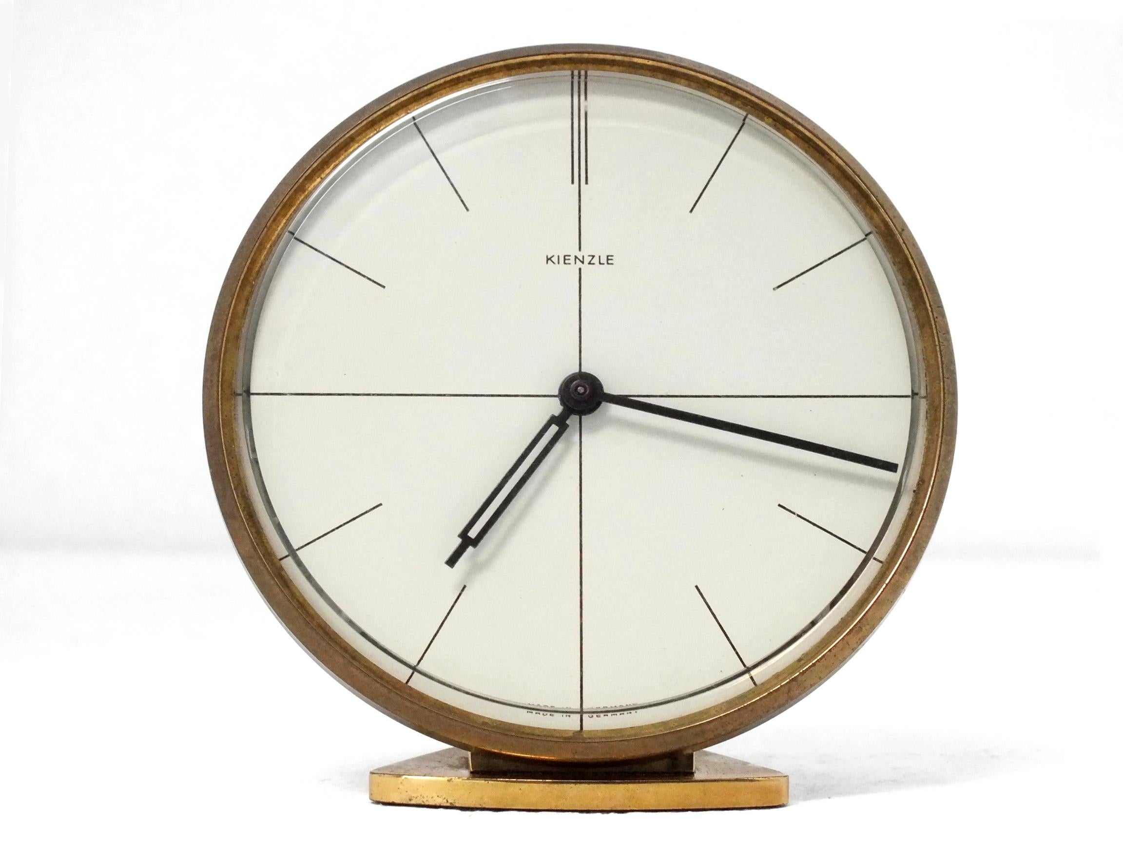 Kienzle Production Germany art decò Heinrich Johannes Möller design years ’50 

 8 days , gold gilded, minimalist watch.
 