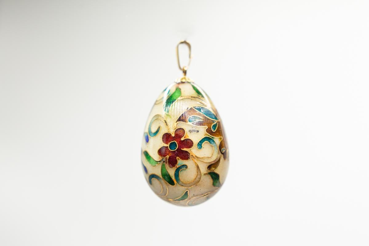 Vintage cloisonné butterfly 1.25 inches egg pendant in 14 k gold bail. Length is without bail. There is a tiny symbol but can not make out. This is such a fine cloisonne’, it looks like painted porcelain. This is high-quality work featuring
