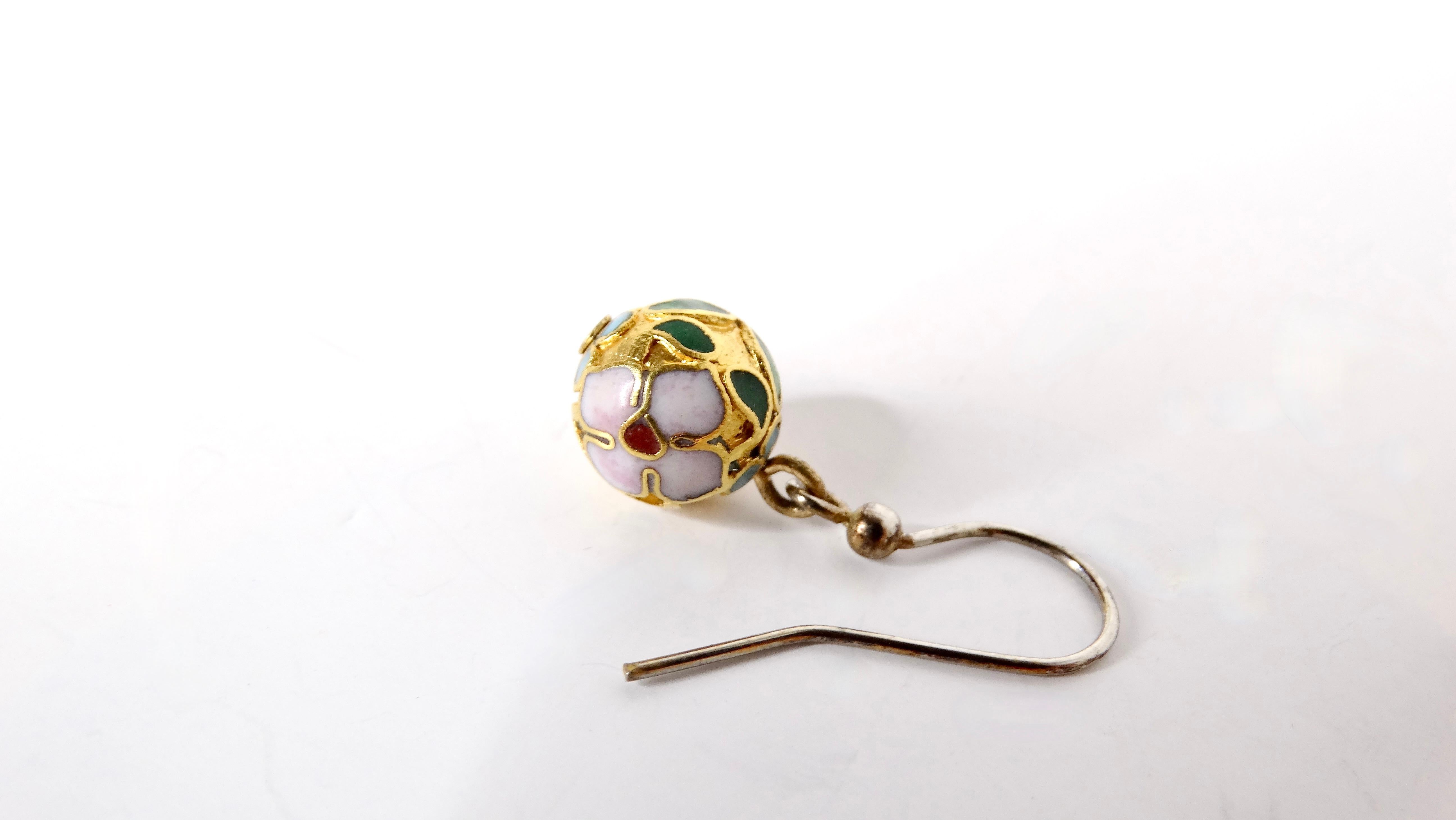 Embrace elegance with these Vintage Cloisonné Enamel 14k Gold Plated Champlevé Ball Dangle Earrings, a true testament to artistry and sophistication. Adorned with a vibrant green hue and an exquisite floral print, these super small earrings offer a