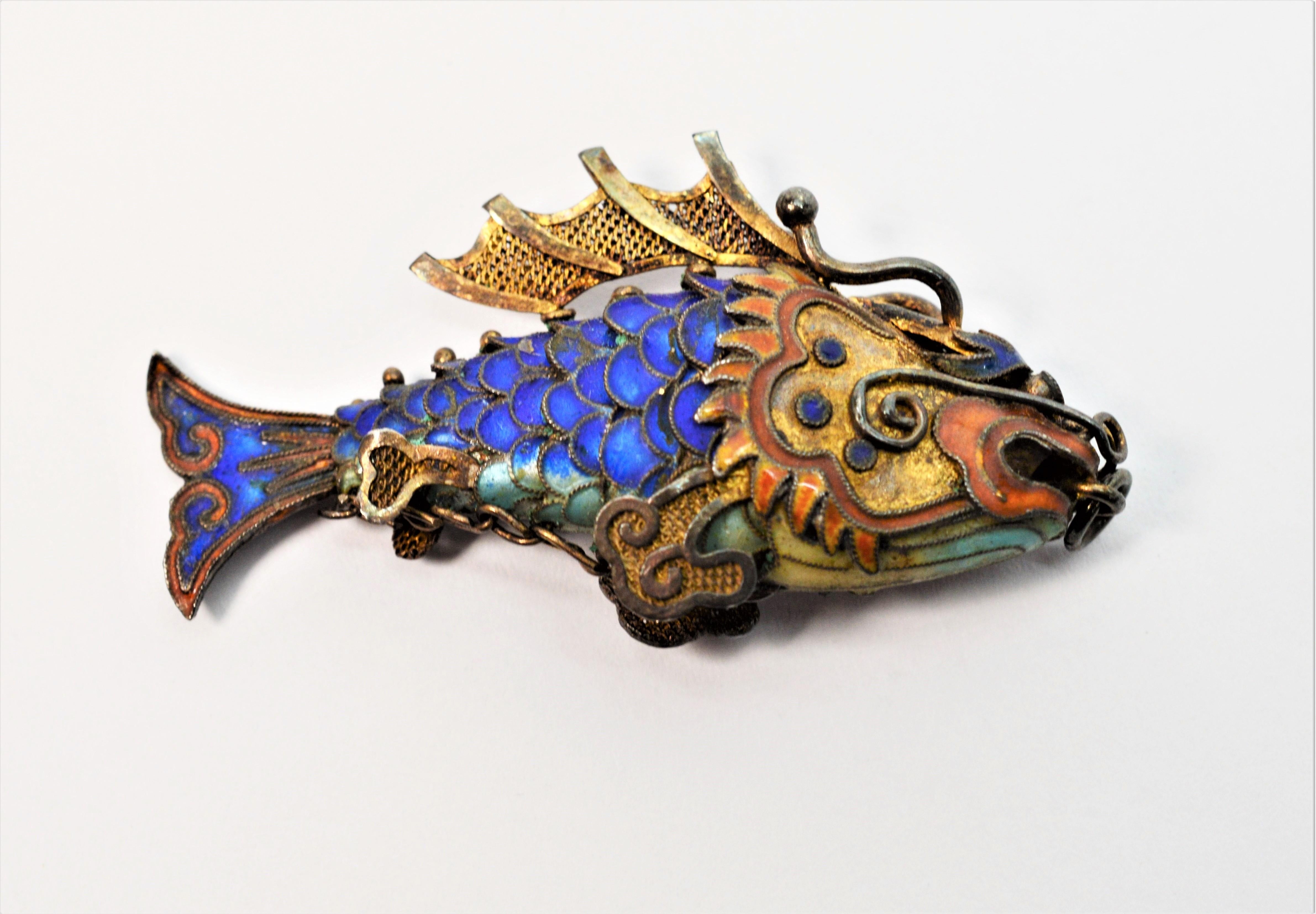 articulated enamel fish pendant