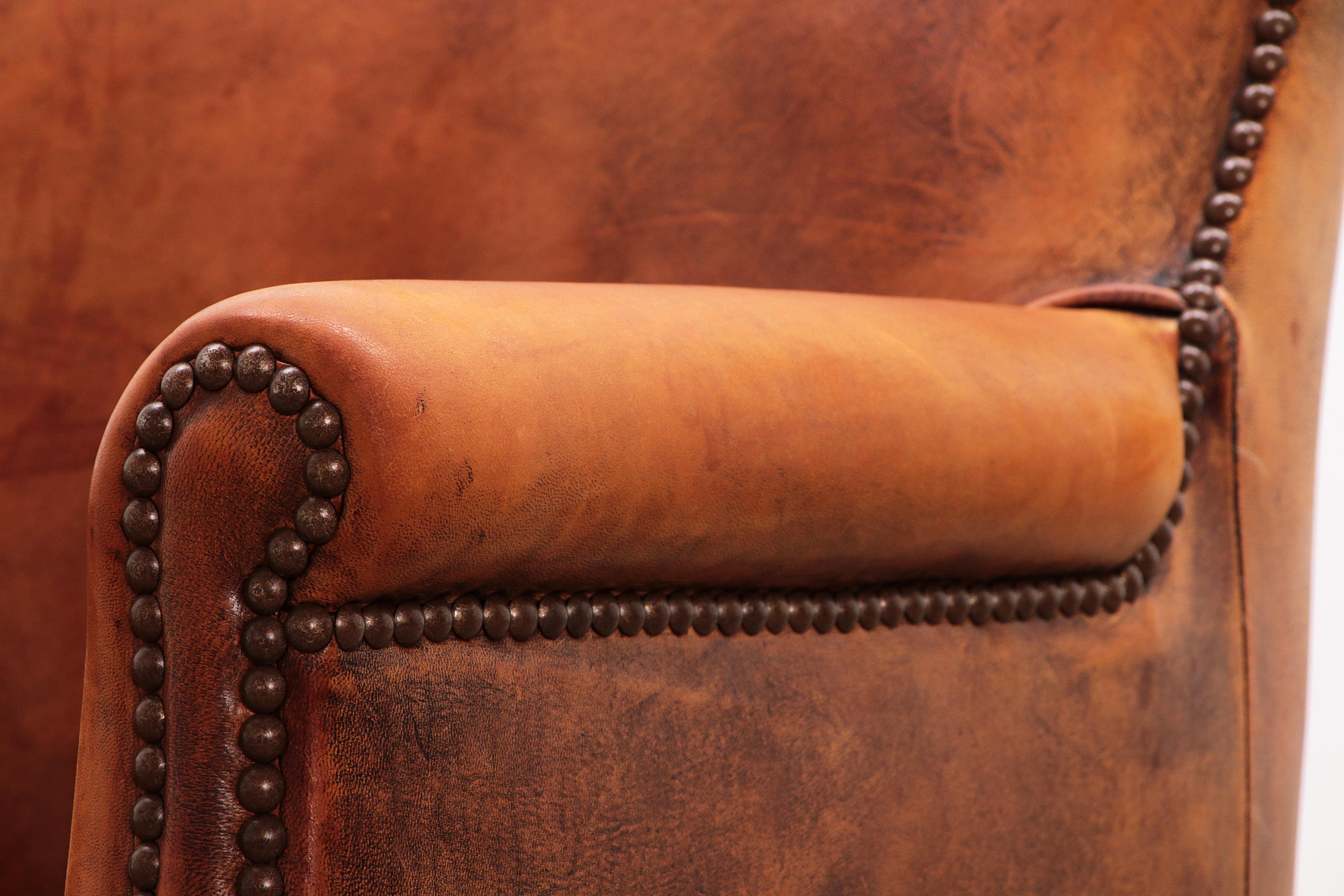 Vintage club armchair made of sheepskin with a beautiful patina, 1970 Netherland For Sale 4
