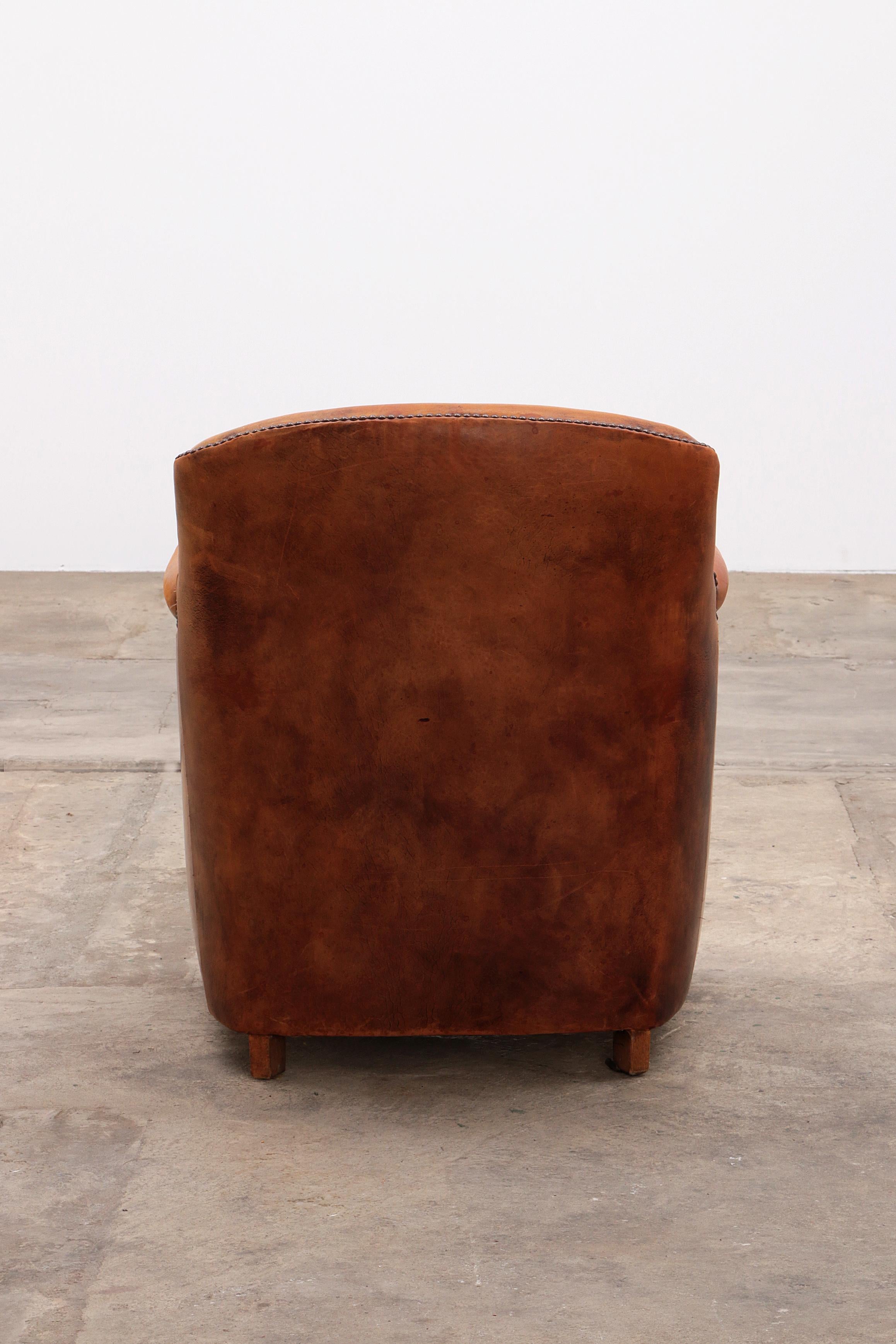 Late 20th Century Vintage club armchair made of sheepskin with a beautiful patina, 1970 Netherland For Sale