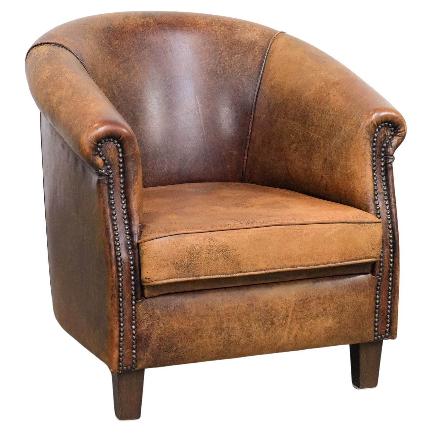 Sillón club vintage de piel de oveja con carácter