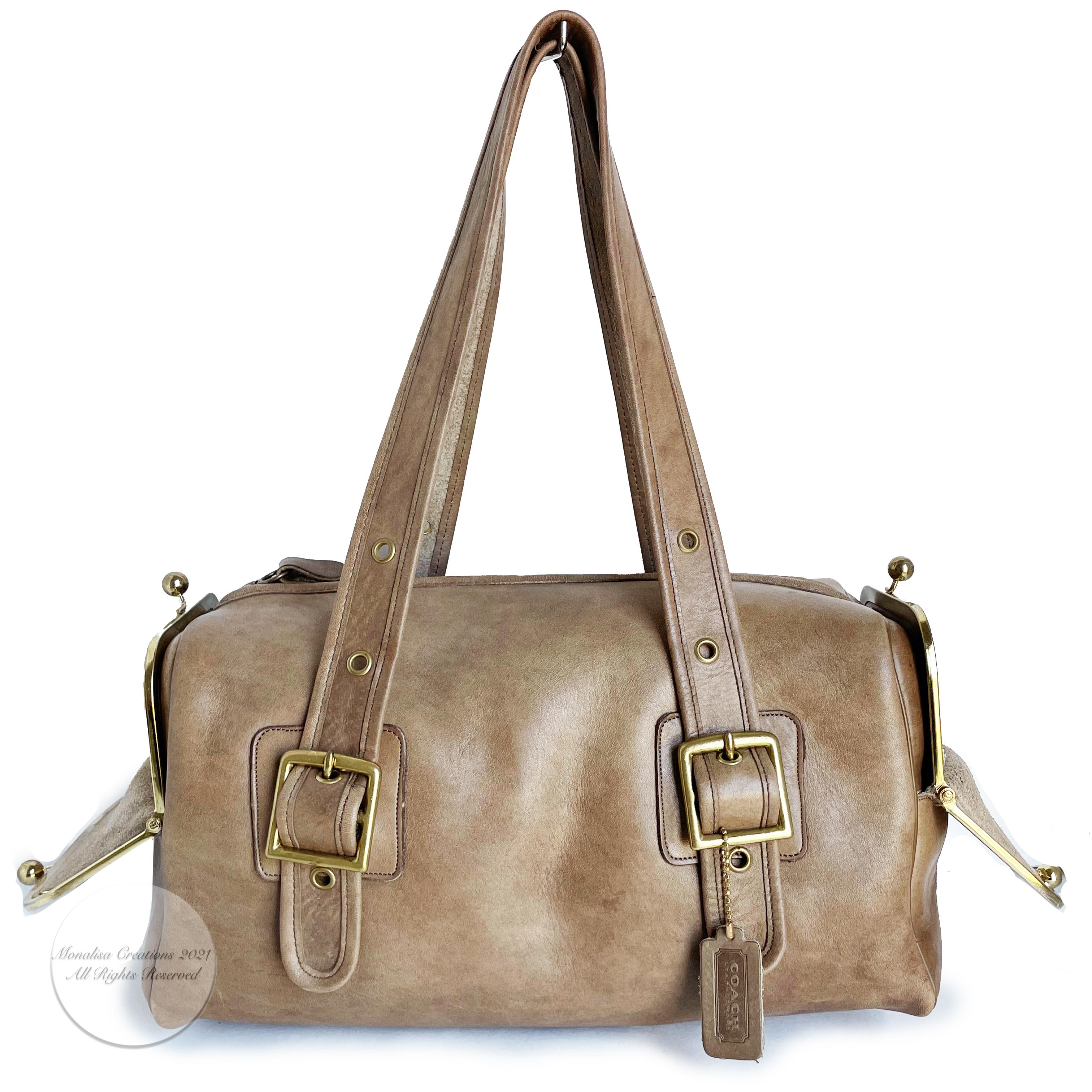 Authentic, preowned, vintage 70s Bonnie Cashin Coach RFD Mailbox bag or tote. A unicorn! Coach re-released a newer version of this bag several years back: this is the original. Pre-creed metal tag. Putty leather/unlined/kiss lock pockets at sides.