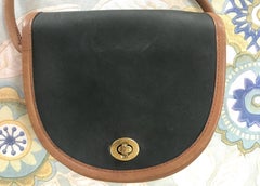 Vintage COACH genuine khaki and brown leather mini shoulder bag.