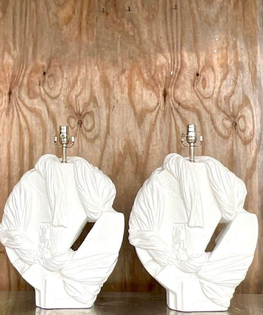 An exceptional pair of vintage Coastal table lamps. Chic abstract knots and swags in plaster. Monumental in size and drama. Fully restored with all new wiring and hardware. Acquired from a Palm Beach estate.