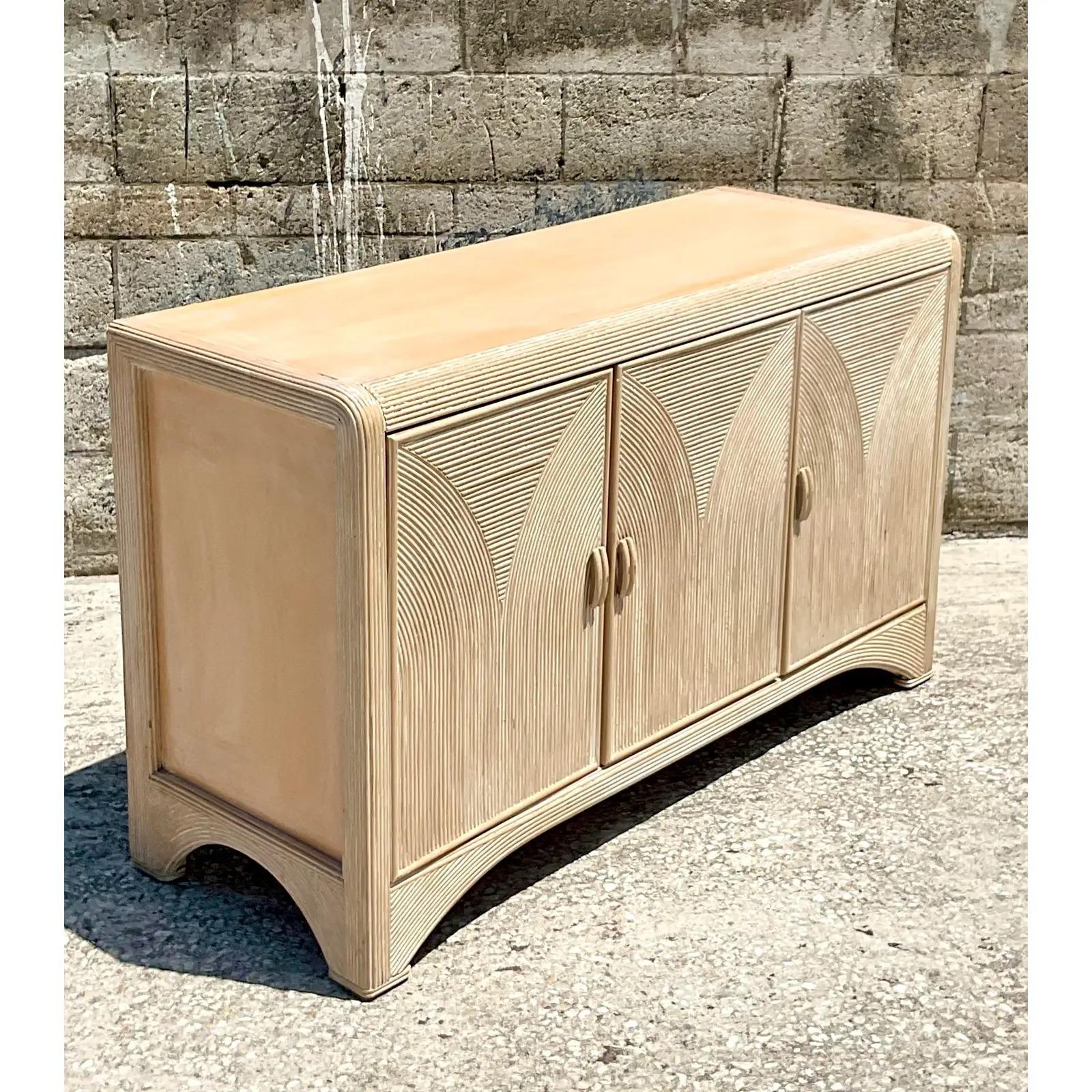 Fantastic vintage Coastal credenza. Beautiful cerused finish in a chic arched design. Lots of great storage below. Acquired from a Palm Beach estate.