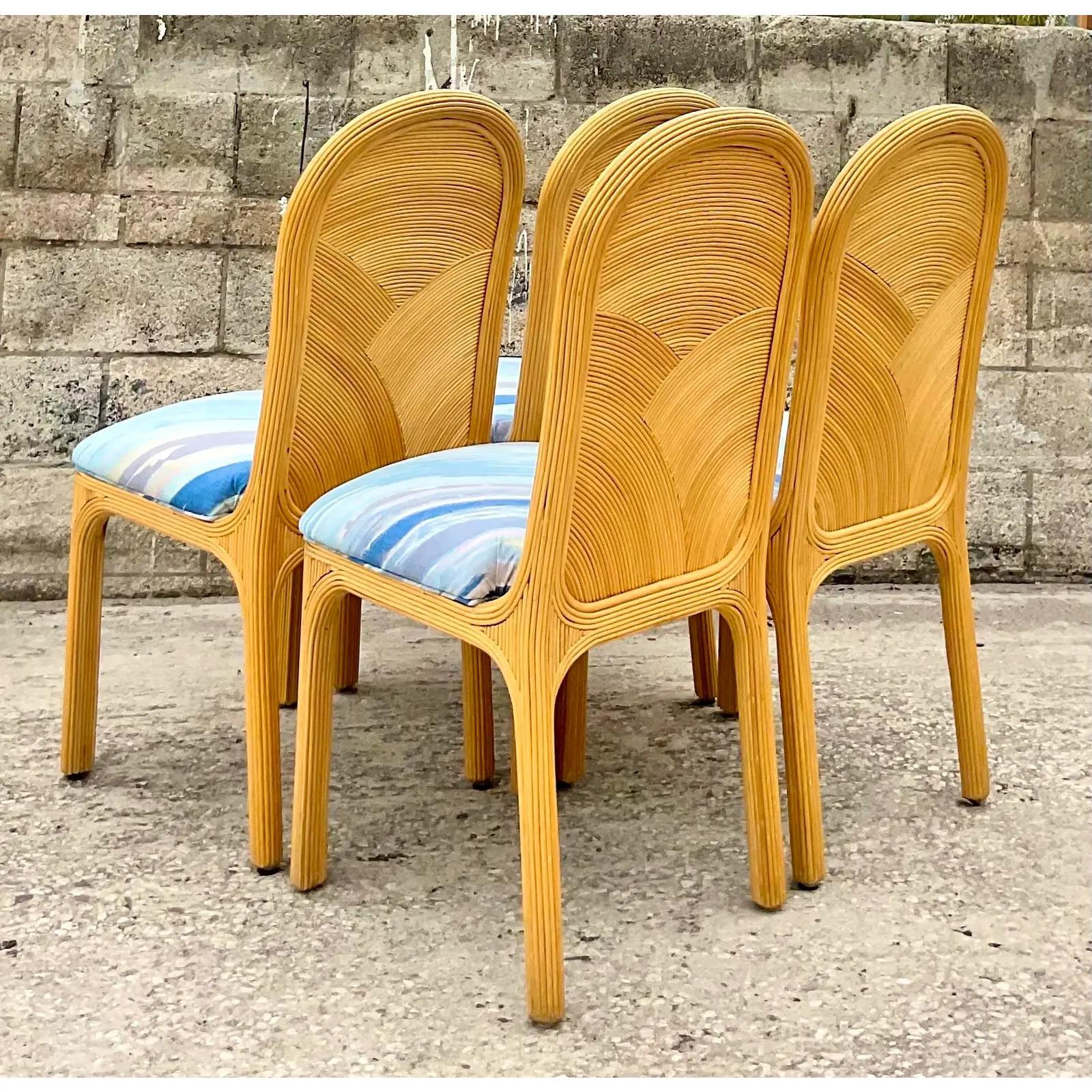 Fantastic set of four vintage dining chairs. Chic arched design in a fab vintage print. Acquired from a Palm Beach estate.