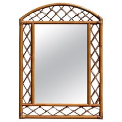 Miroir mural vintage en rotin arqué et treillis