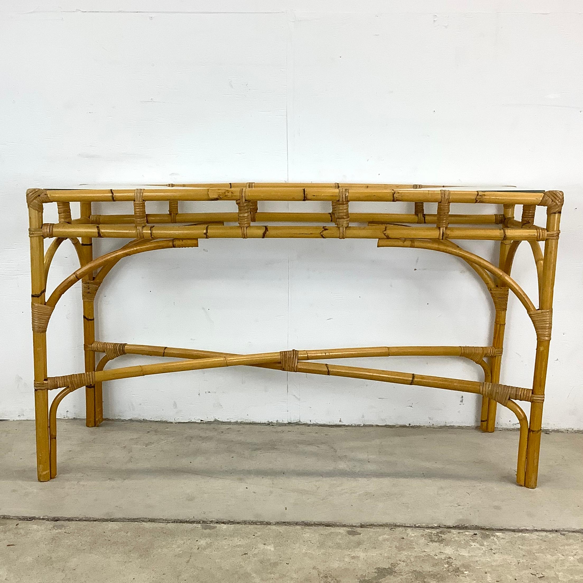 Step into a world of coastal elegance with this retro Boho Rattan Console Table. A true embodiment of the coastal chic aesthetic, this piece captures the essence of relaxed island living, making it an ideal addition to any modern or beach-inspired