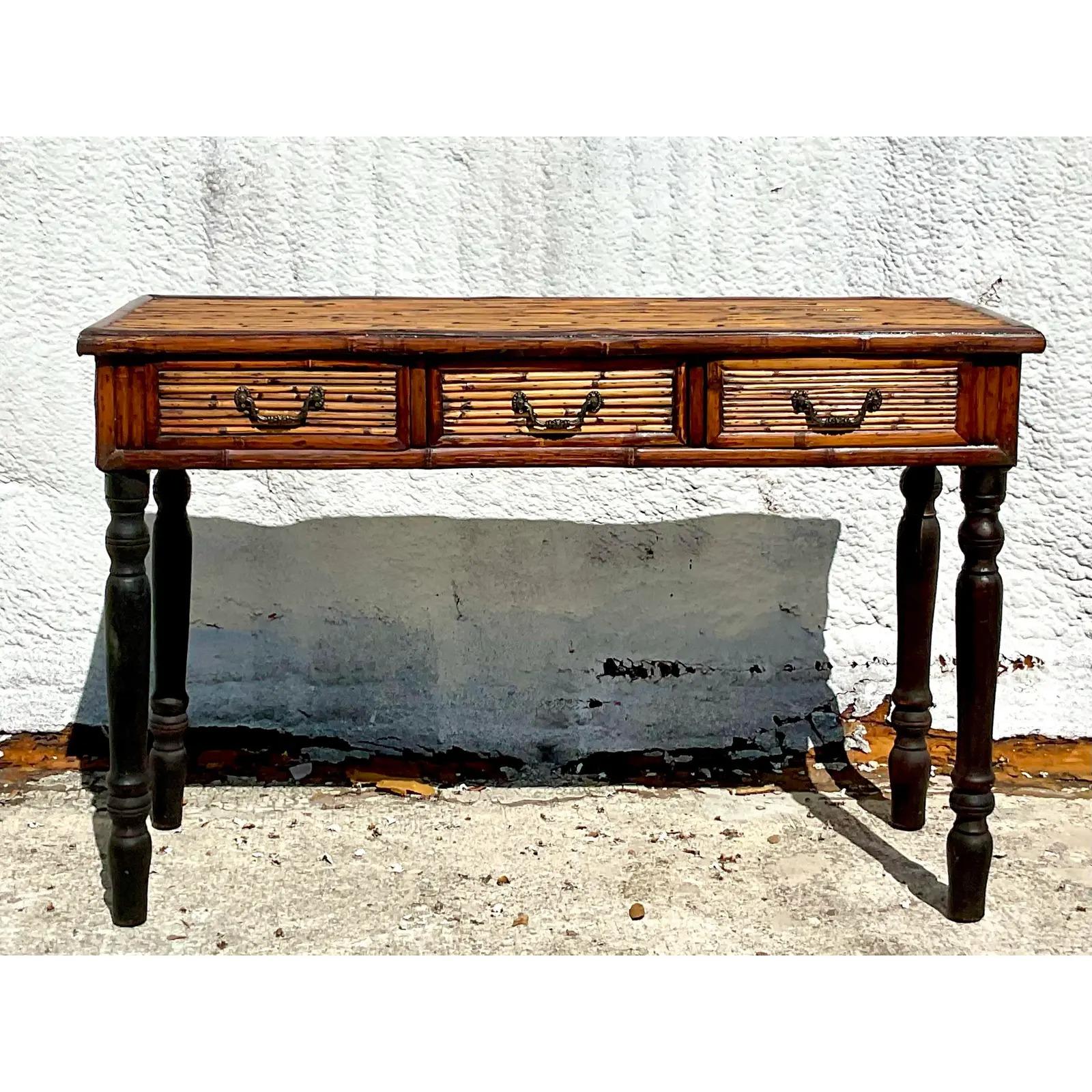 Vintage Coastal bamboo console table. Beautiful farmhouse style with hand turned legs. Acquired from a Palm Beach estate.