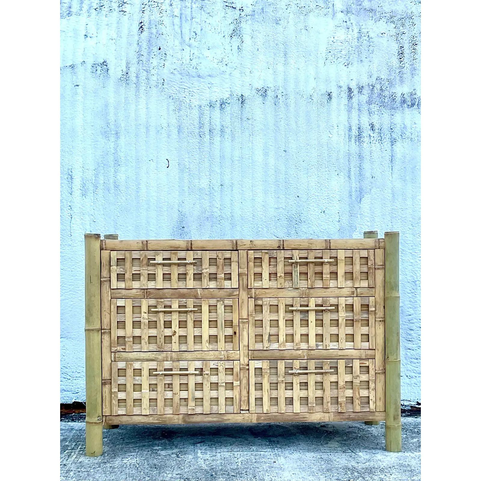 A fantastic vintage Coastal six drawer dresser. Thick bamboo frame with split bamboo drawer fronts. Acquired from a Palm Beach estate.