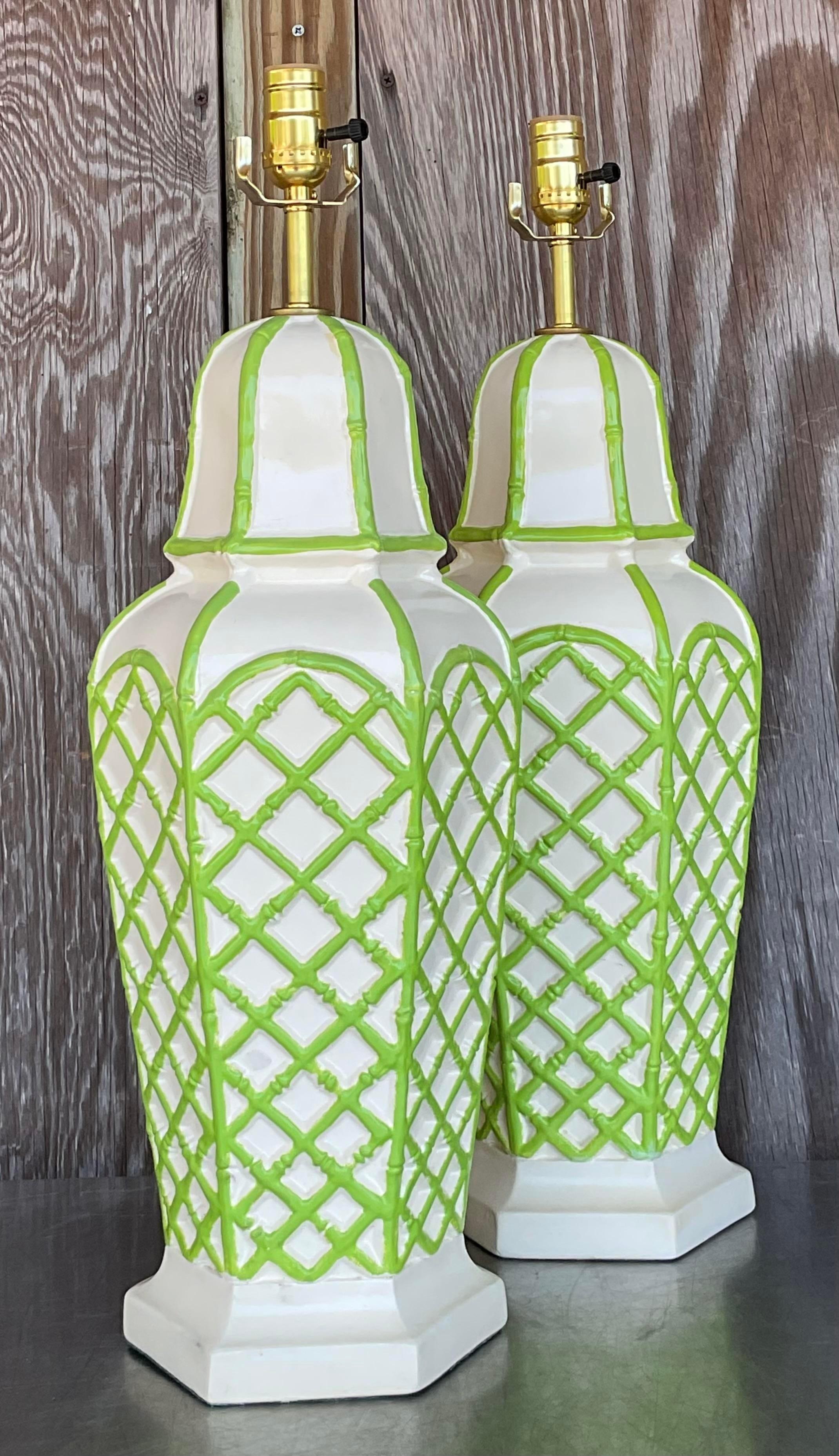 Illuminate your coastal retreat with this pair of vintage bamboo trellis glazed ceramic lamps. American-crafted with a nod to seaside charm, these lamps combine organic textures with glazed finishes, adding a touch of coastal elegance to any space