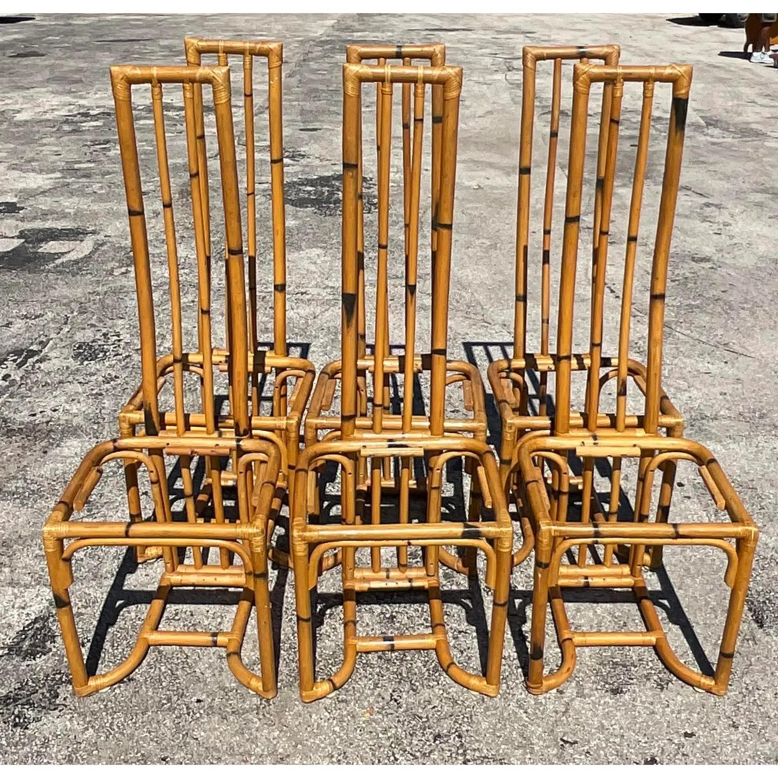 A fabulous set of six vintage Coastal dining chairs. Beautiful bent bamboo in a chic high back design. Slender and styling and a great addition to any décor. I have all the seats and they will be included. Acquired from a Palm Beach estate.

The
