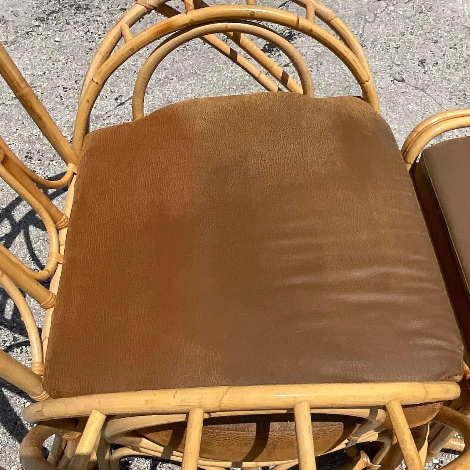 Vintage Coastal Bent Rattan Butterfly Chair and Ottoman After McGuire In Good Condition In west palm beach, FL