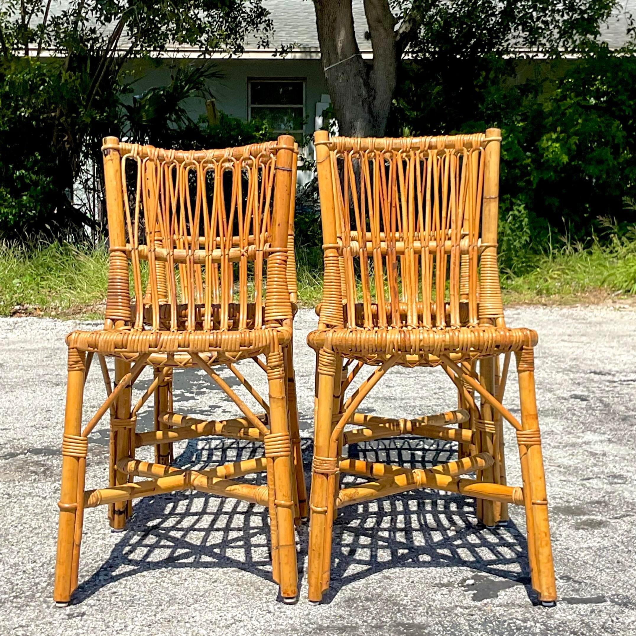 Vintage Coastal Bent Rattan Dining Chairs - Set of 4 In Good Condition In west palm beach, FL