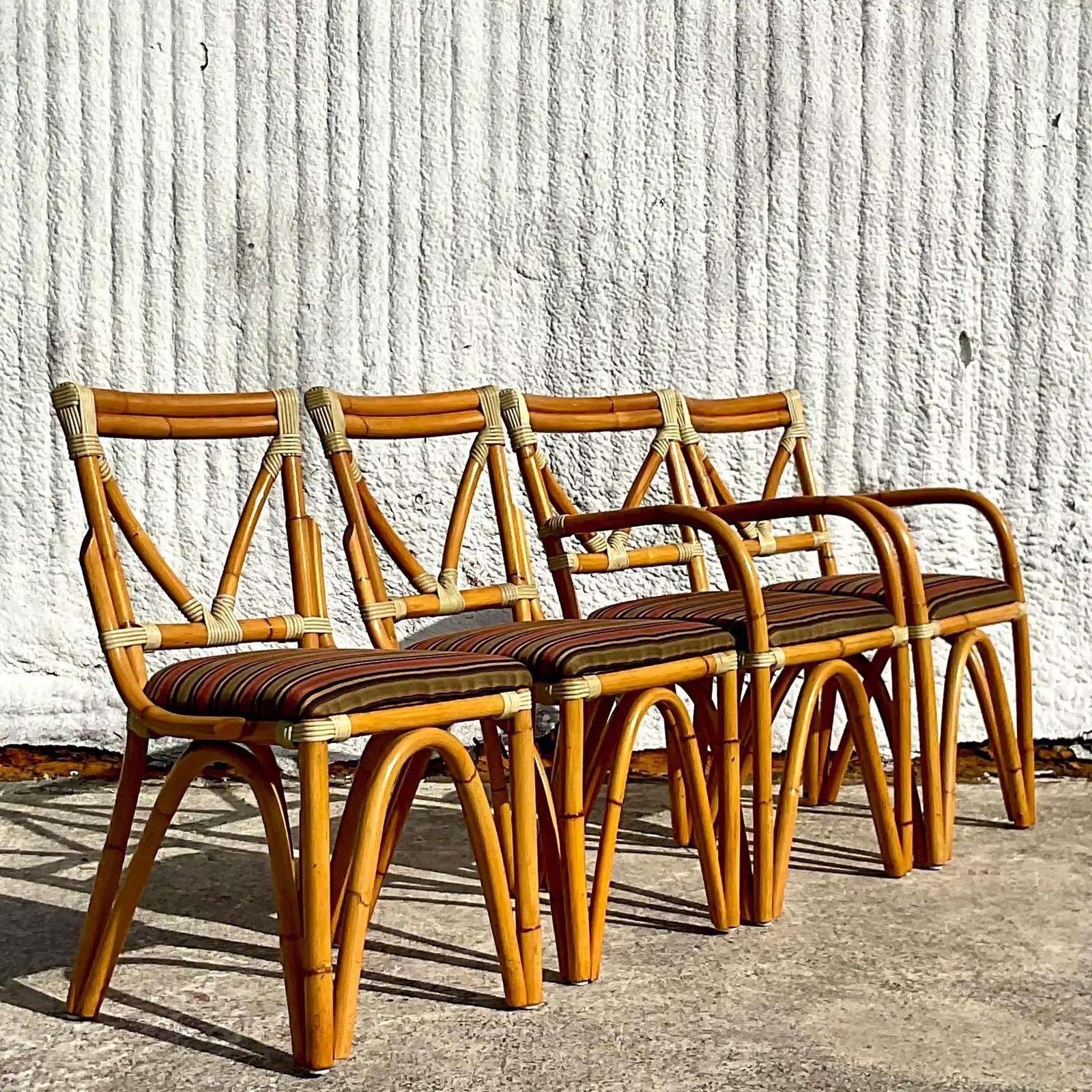 Philippin Vintage Coastal Bent Rattan Dining Chairs - Set of Four en vente