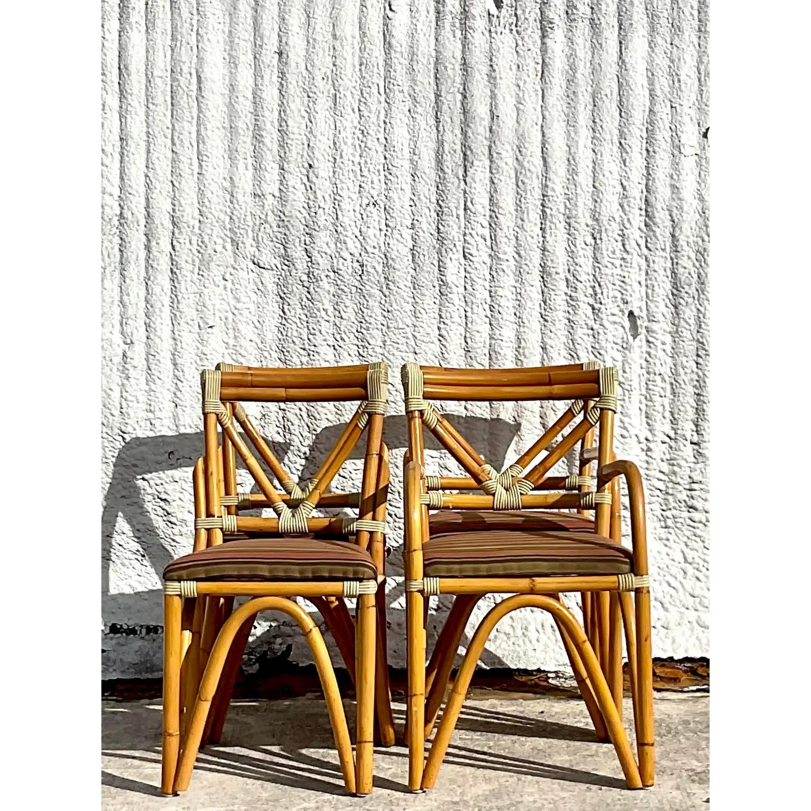 Philippine Vintage Coastal Bent Rattan Dining Chairs - Set of Four For Sale