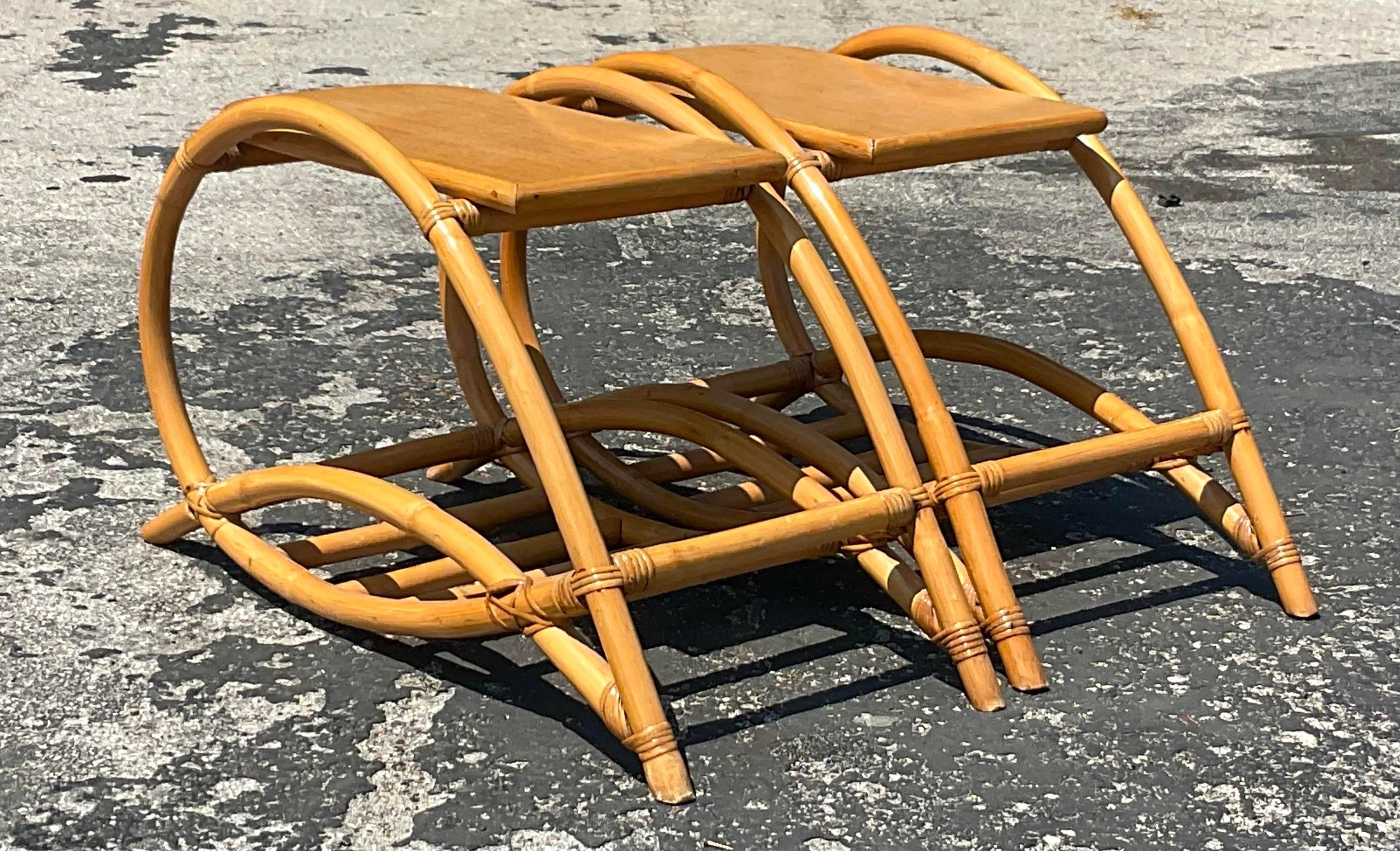 A fabulous vintage Coastal side tables. A chic loop design in a thick bent rattan. Laminate tops for easy maintenance. Perfect for that summer hospice with lots of entertaining! Acquired from a Palm Beach estate.