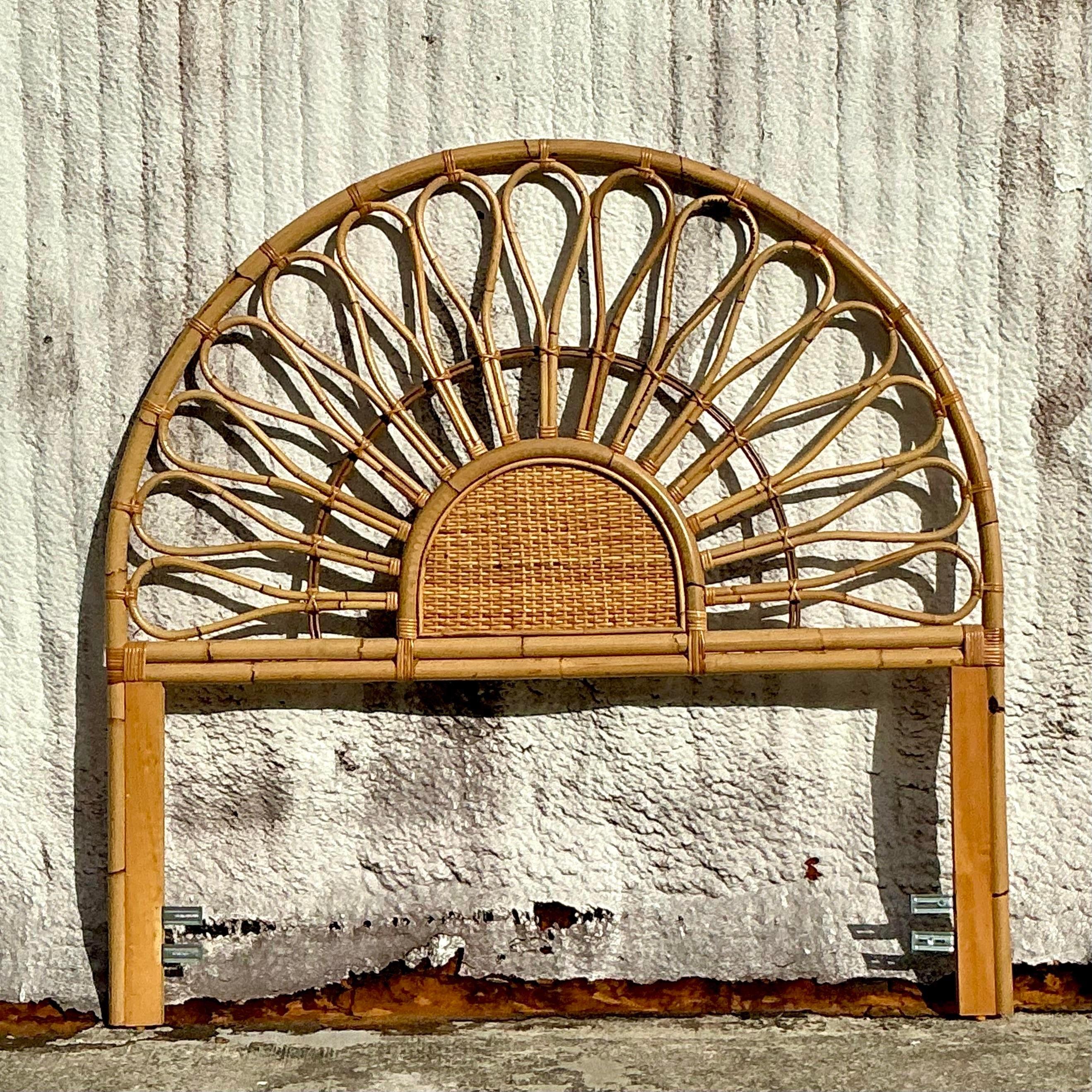 Bring a relaxed, beachy vibe to your bedroom with this Vintage Coastal Bent Rattan Queen Headboard. Crafted with elegantly curved rattan, this headboard showcases the natural beauty and airy feel of coastal design. The intricate pattern and smooth