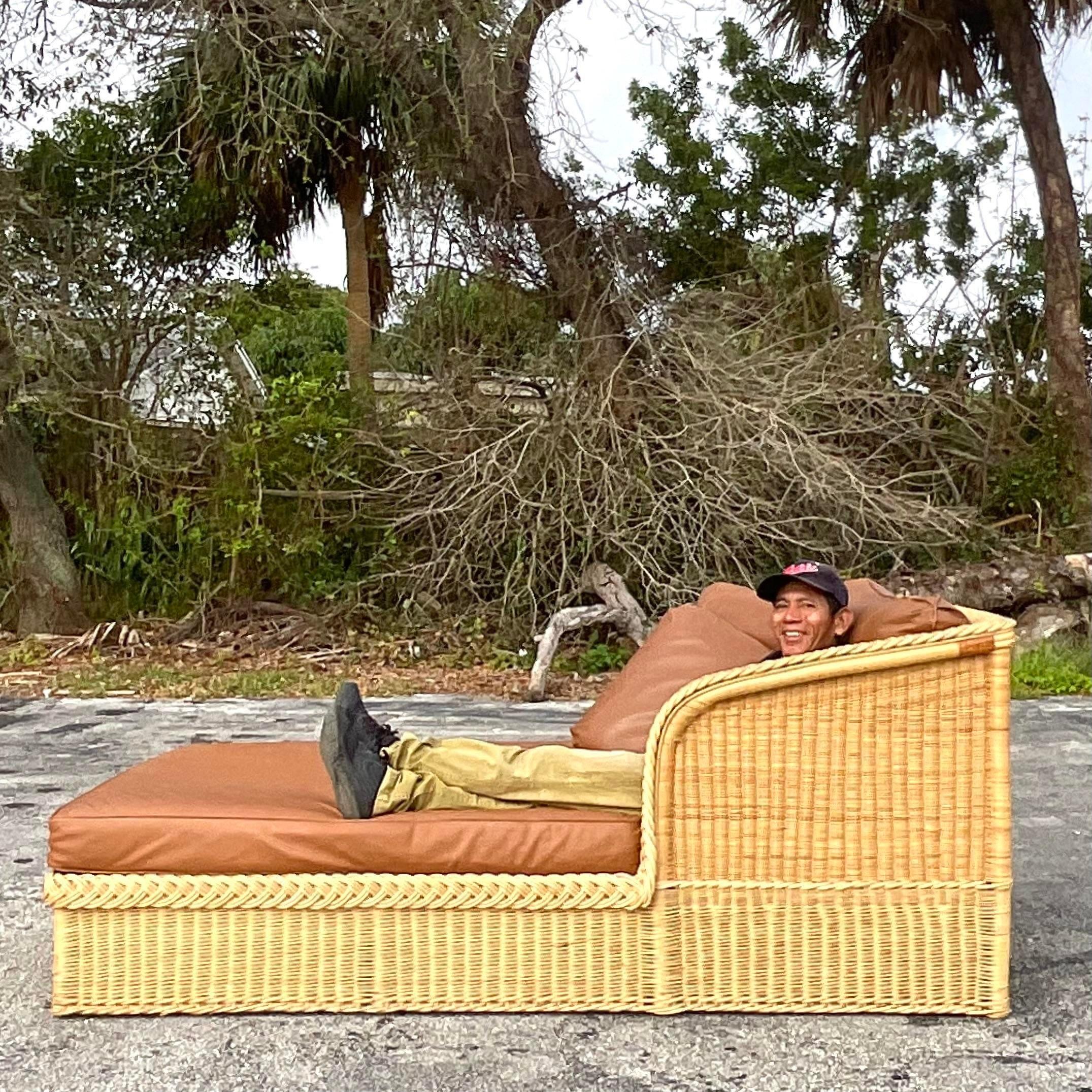 20th Century Vintage Coastal Bielecky Brothers Braided Rattan and Leather Chaise Lounge For Sale