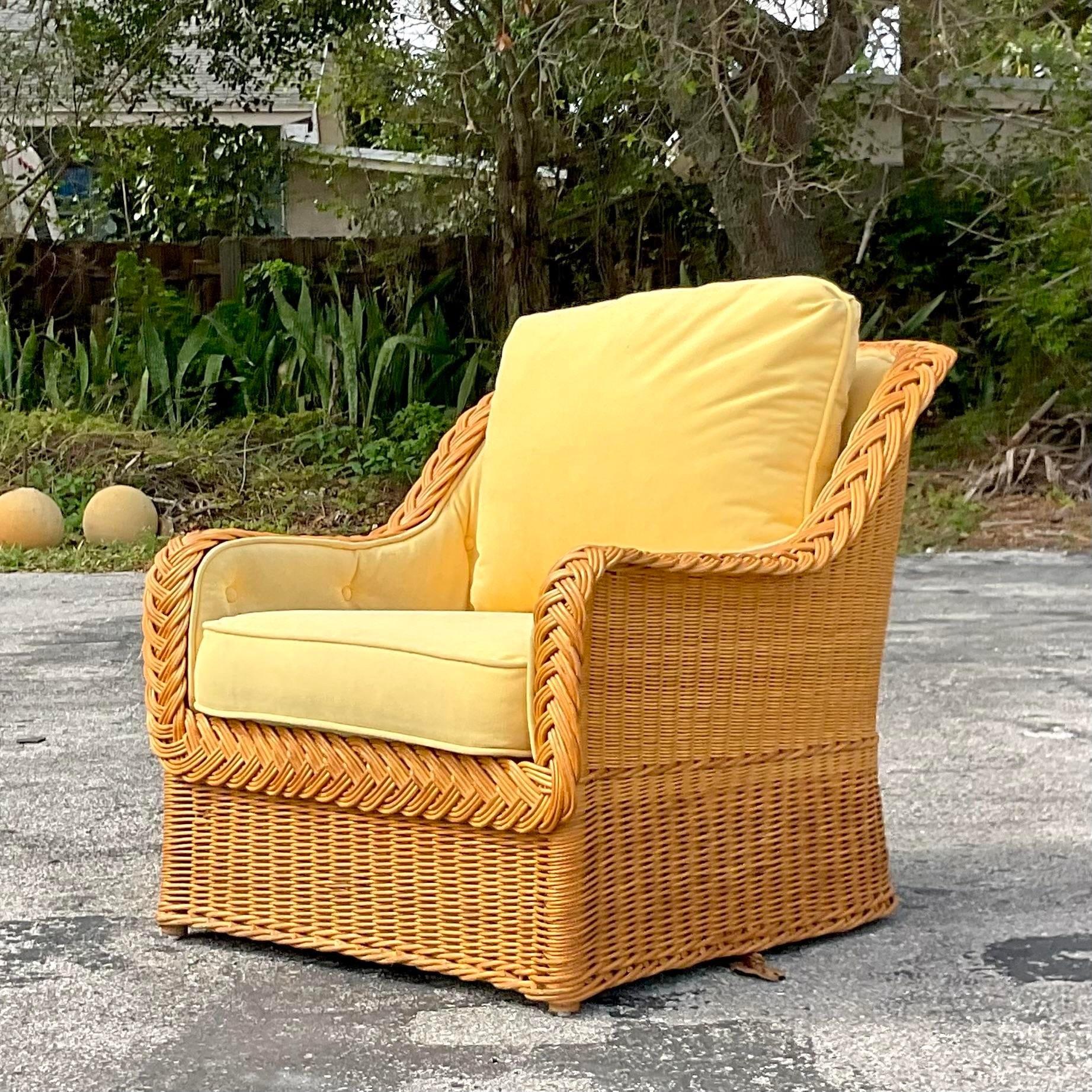 A fantastic vintage Coastal lounge chair. Made by the iconic Bielecky Brothers and tagged below the cushion. A tufted cushion around the back with a loose additional cushion. Acquired from a Palm Beach estate. 