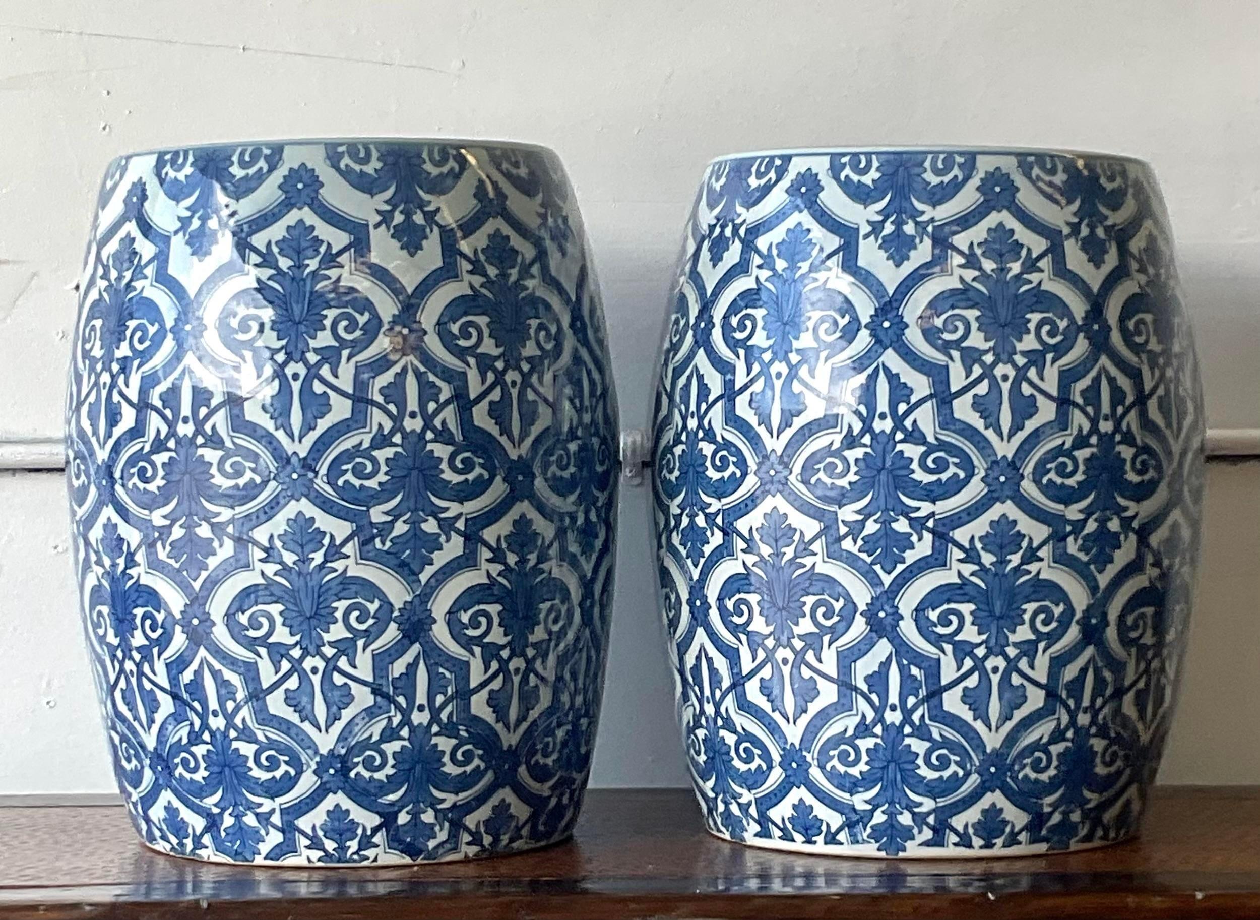 A fabulous pair of vintage Coastal garden stools. A chic blue and white Moroccan design in a matte glaze finish. Acquired from a Palm Beach estate