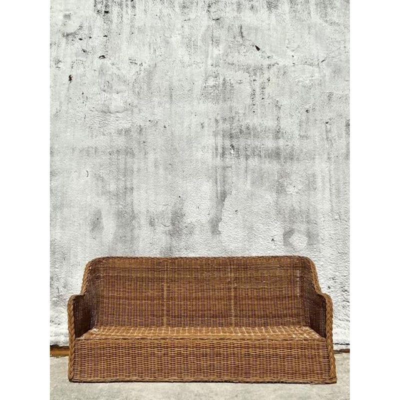 20th Century Vintage Coastal Braided Rattan Sofa For Sale