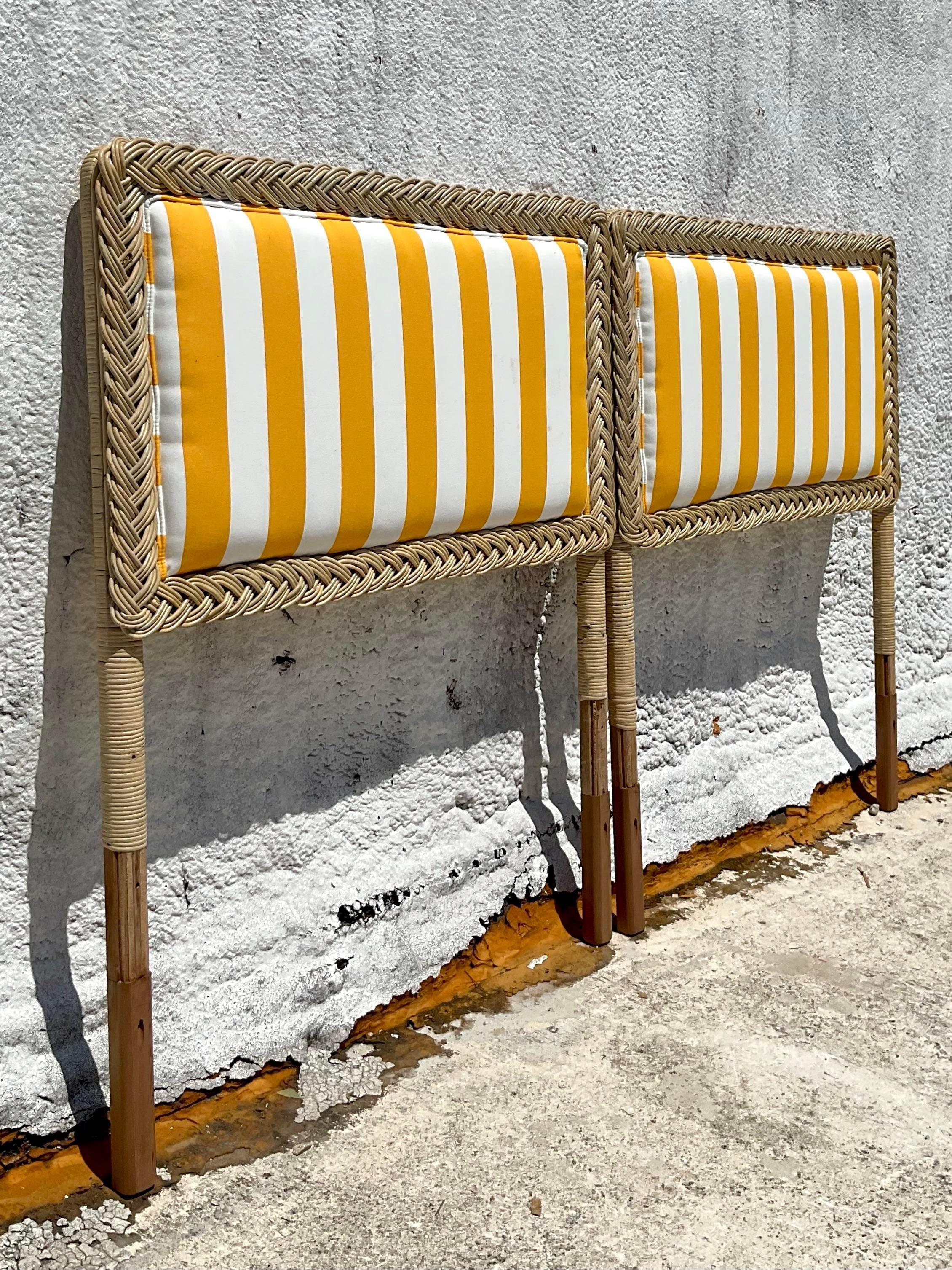 The Vintage Coastal Braided Rattan Twin Beds - A Pair embody American coastal style with their timeless braided rattan design and classic twin bed silhouette. These charming beds bring a touch of seaside nostalgia and relaxed elegance to any