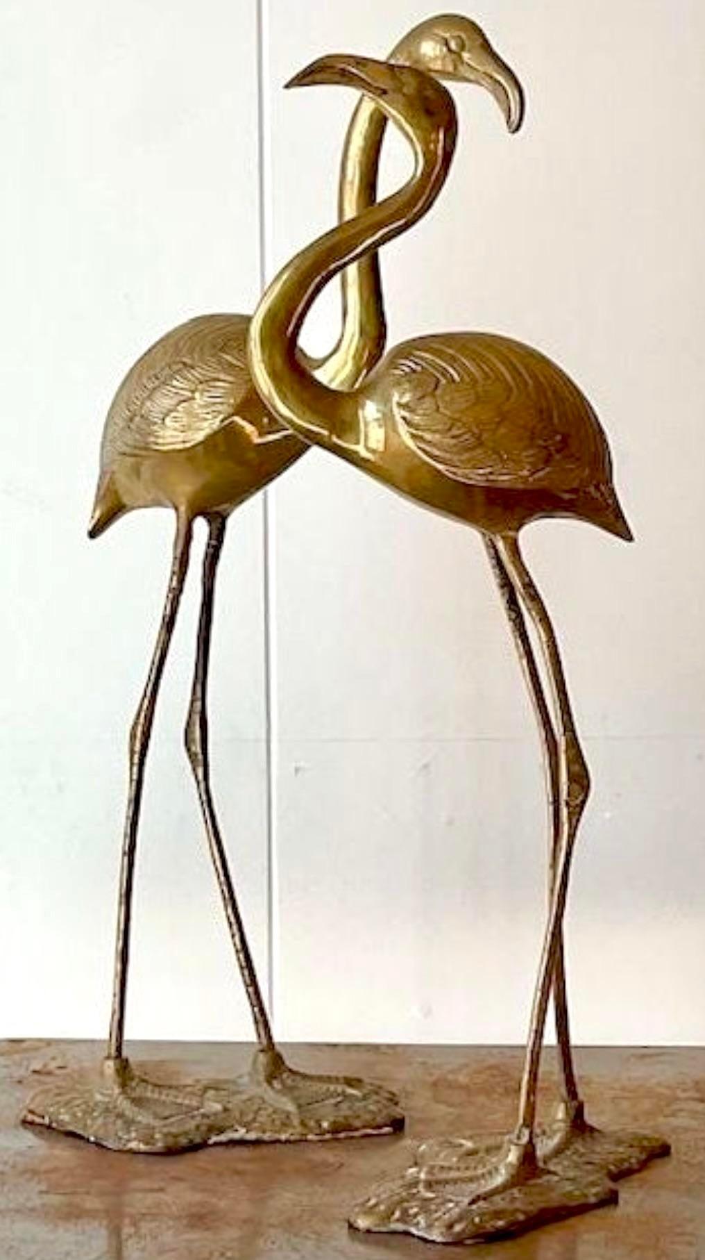 A stunning pair of vintage Boho brass flamingos. Monumental in size and drama. Acquired from a Palm Beach estate.
