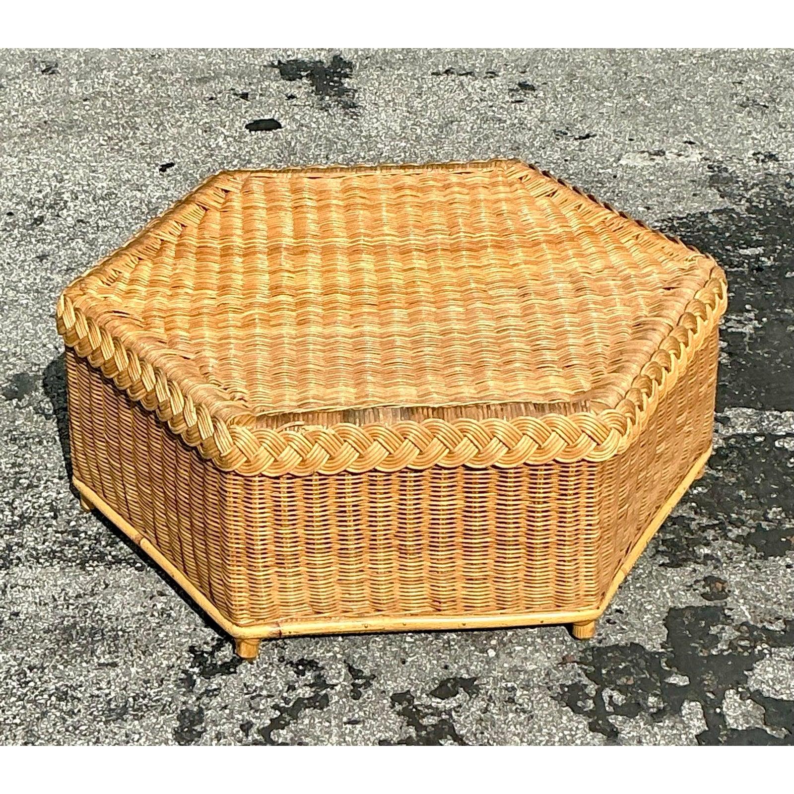 Discover the exquisite charm of this Vintage Coastal Brown Jordan Braided Rattan Hexagonal Coffee Table Ottoman, a truly unique piece that blends functional design with a relaxed, elegant aesthetic. Crafted by the renowned Brown Jordan, a leader in
