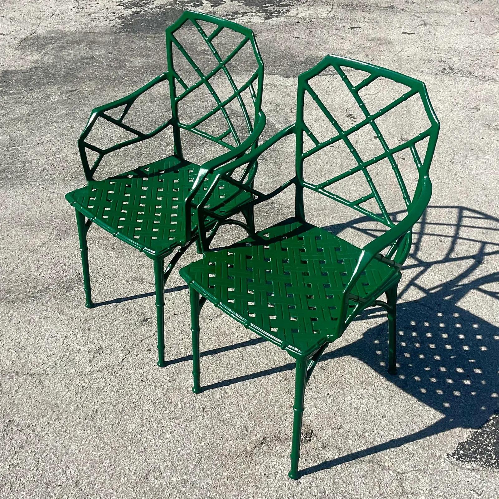 A fabulous pair of vintage Coastal outdoor arm chairs. The “Calcutta” design from the iconic Brown Jordan. A chic Chinese Chippendale design in cast aluminum in a Kelly green gloss finish. Easily changed to suit your project. Unmarked. Acquired from