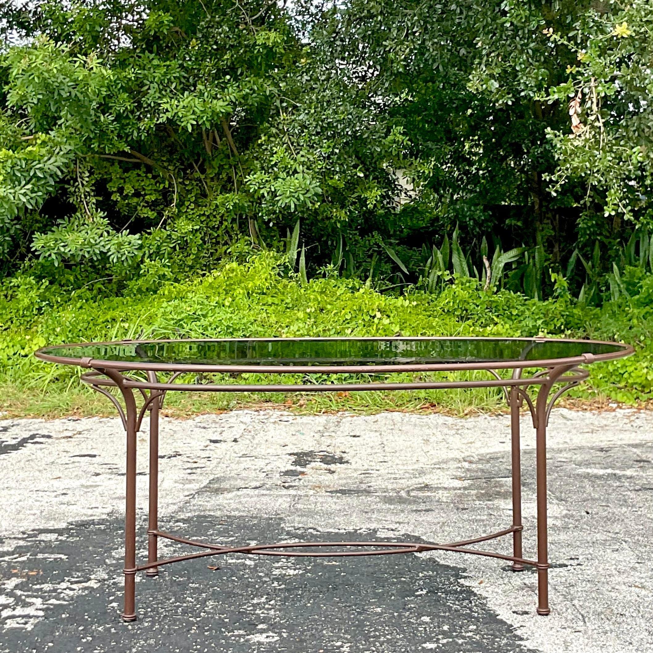 A fantastic vintage Coastal cast aluminum outdoor dining set. Made by the iconic Brown Jordan and tagged on the bottom. Part of the coveted Florentine collection. Acquired from a Naples estate.

Arm chair - 22.75 wide
Table - 72x 47.5x29
Seat height
