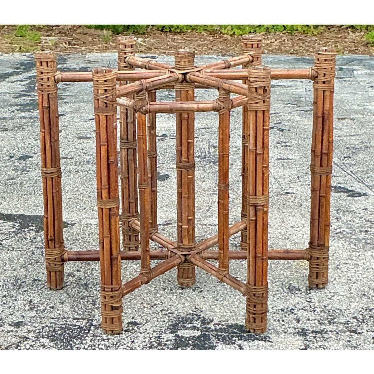 Add a touch of relaxed, natural elegance to your space with this Vintage Coastal Bundled Rattan piece, inspired by the iconic designs of McGuire. Crafted with meticulously woven rattan, this piece showcases the beauty of organic materials in a